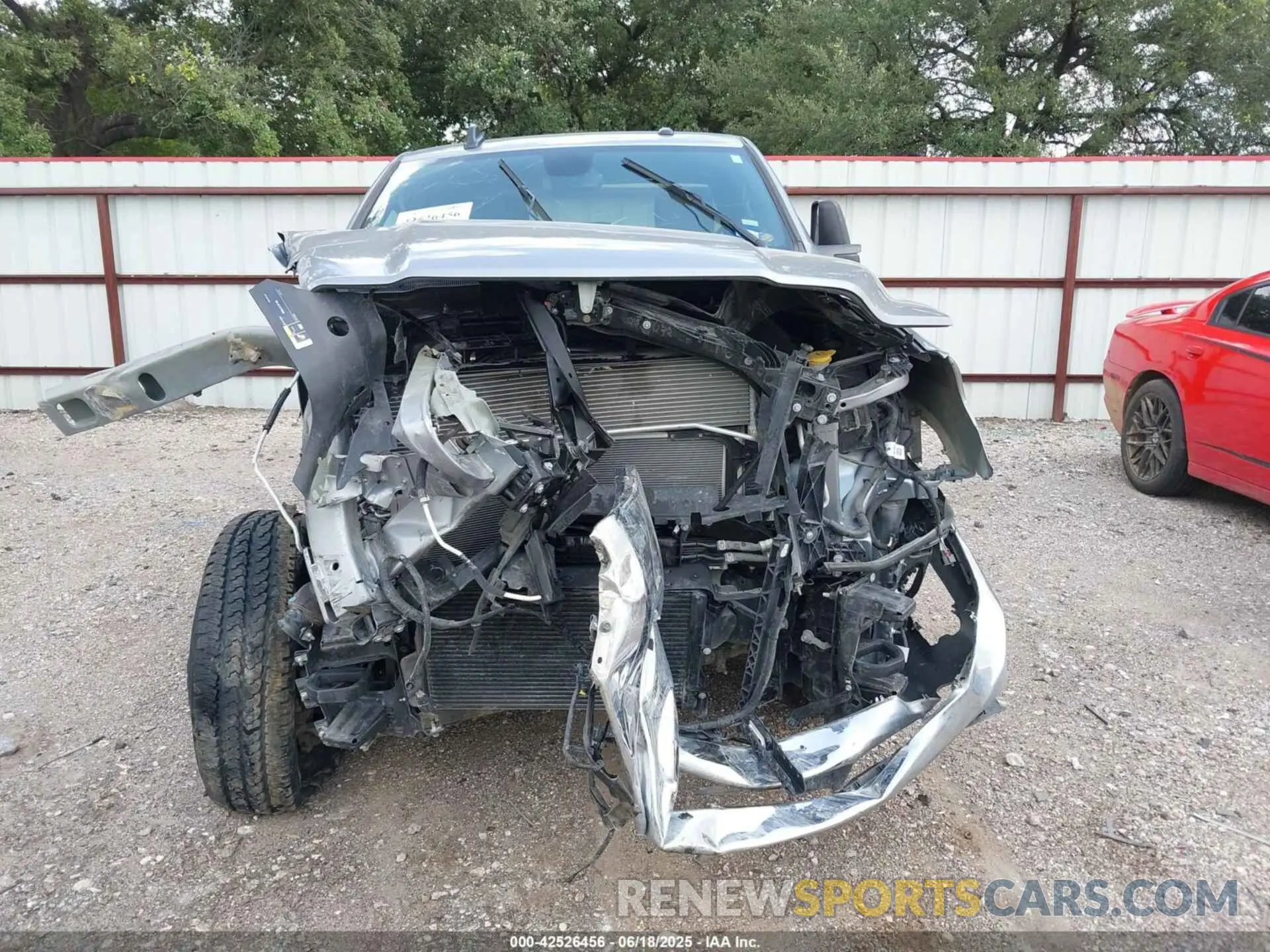 13 Photograph of a damaged car 3C6UR5DL8RG343566 RAM 2500 2024