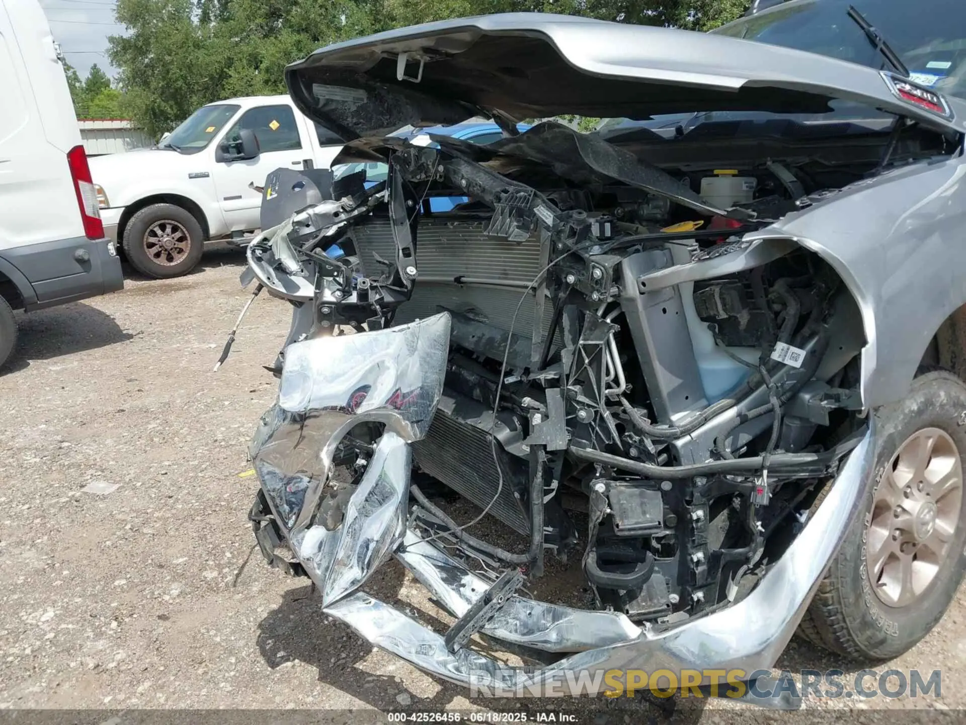 6 Photograph of a damaged car 3C6UR5DL8RG343566 RAM 2500 2024