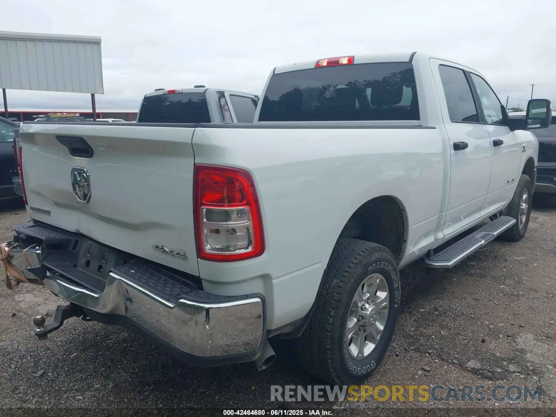 4 Photograph of a damaged car 3C6UR5DL9RG286018 RAM 2500 2024