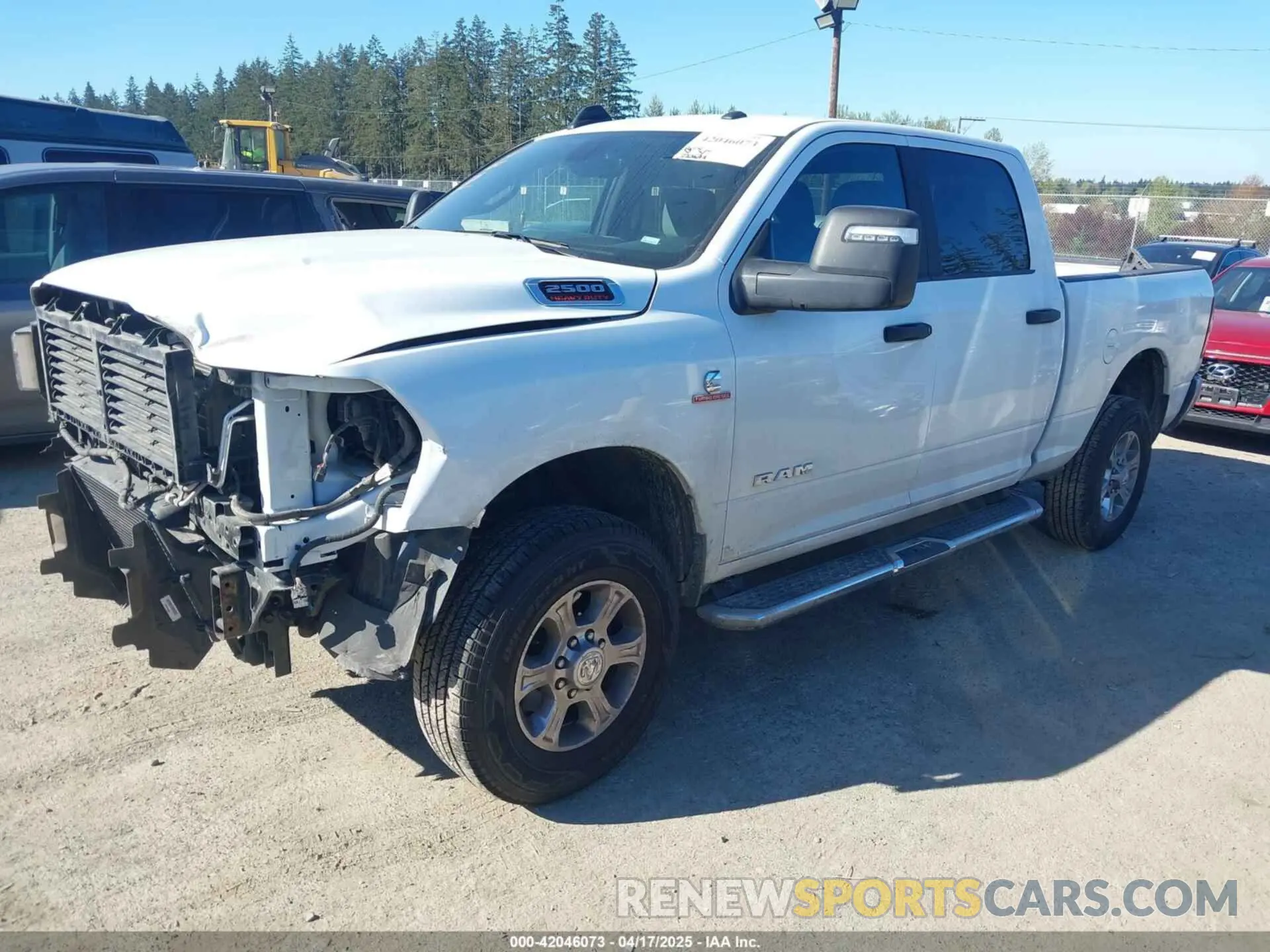 2 Photograph of a damaged car 3C6UR5DL9RG303433 RAM 2500 2024