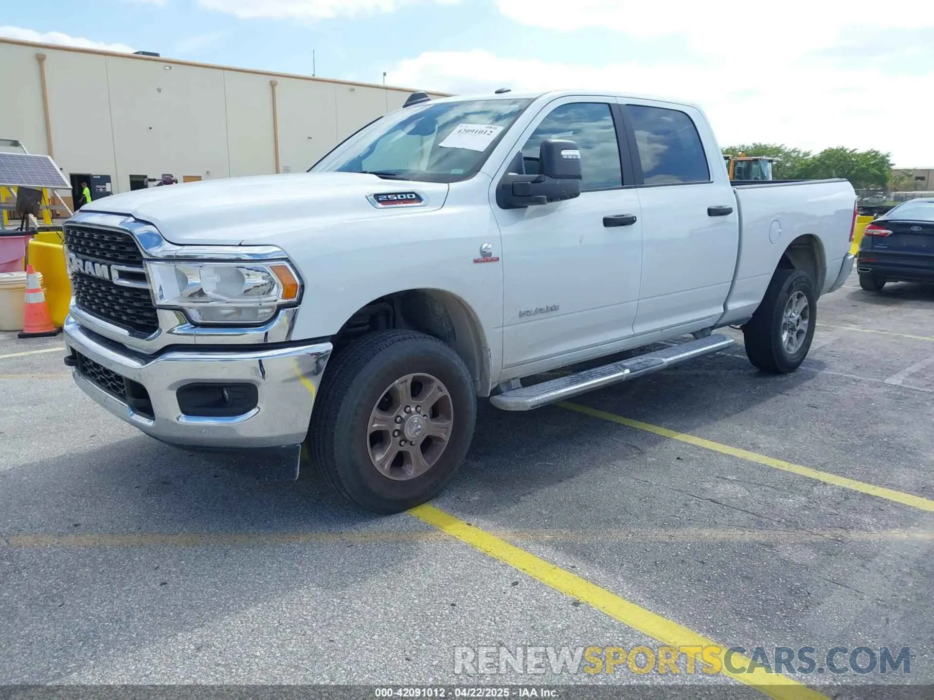 2 Photograph of a damaged car 3C6UR5DL9RG338196 RAM 2500 2024