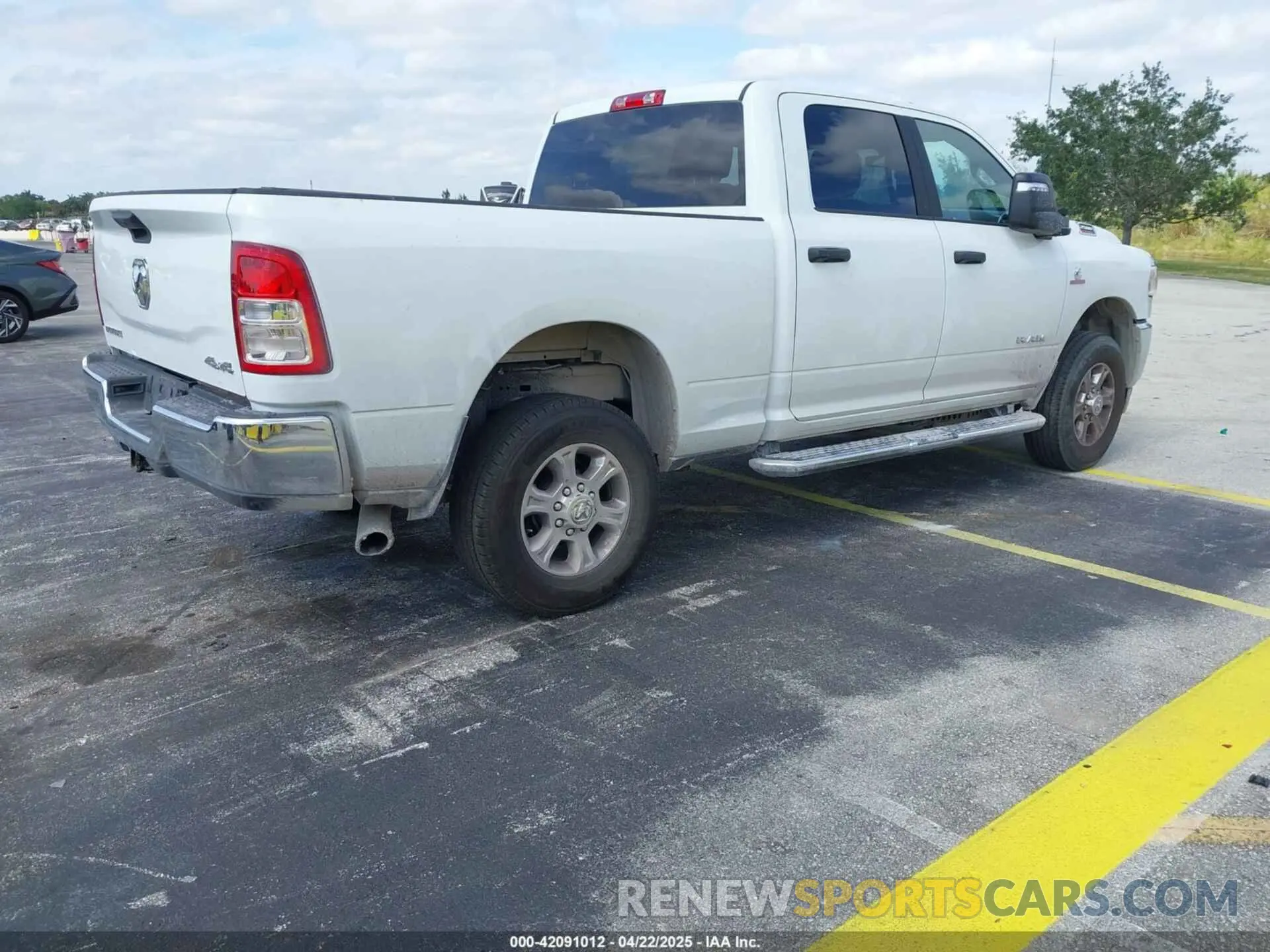 4 Photograph of a damaged car 3C6UR5DL9RG338196 RAM 2500 2024