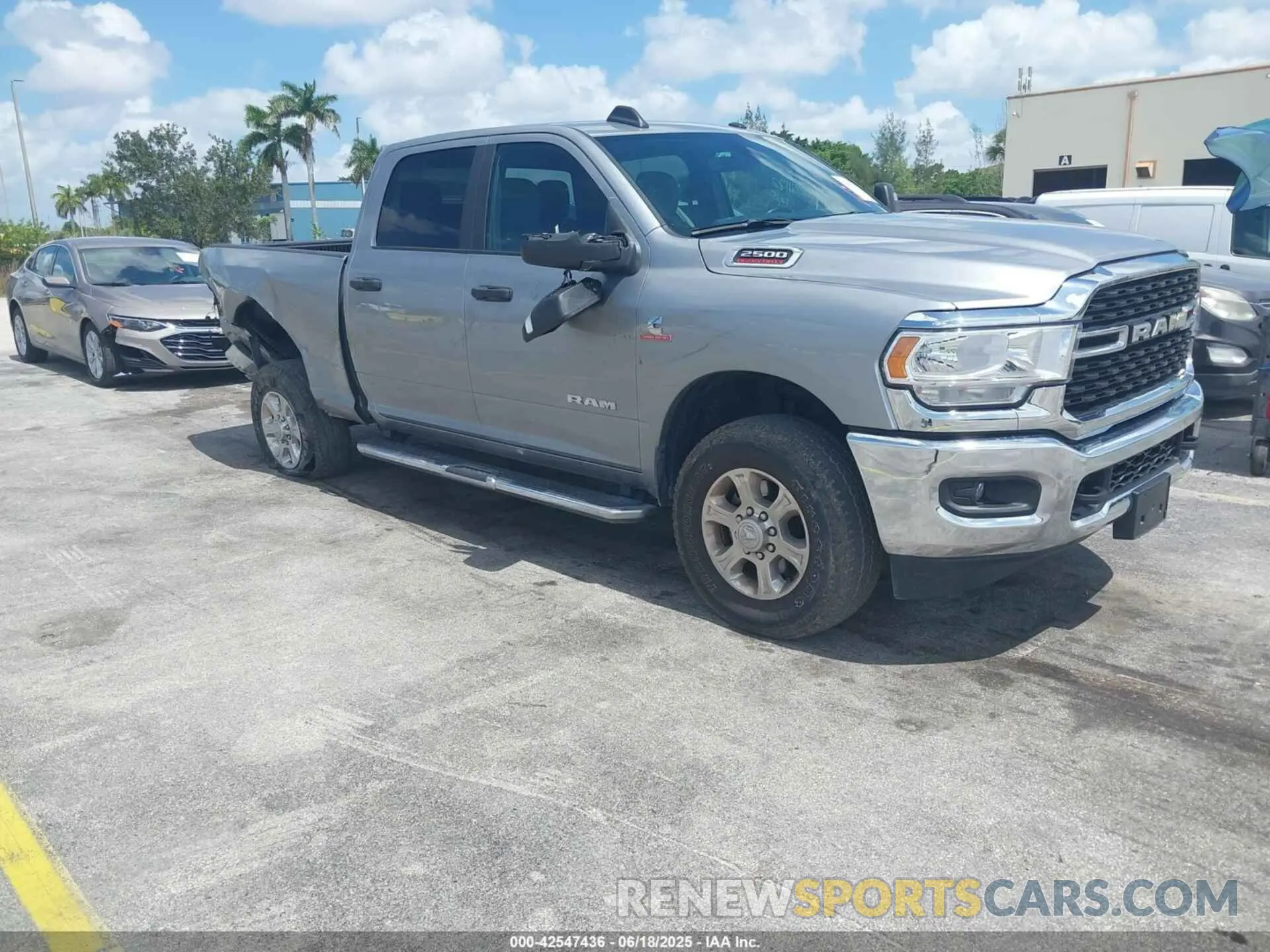 1 Photograph of a damaged car 3C6UR5DL9RG348839 RAM 2500 2024