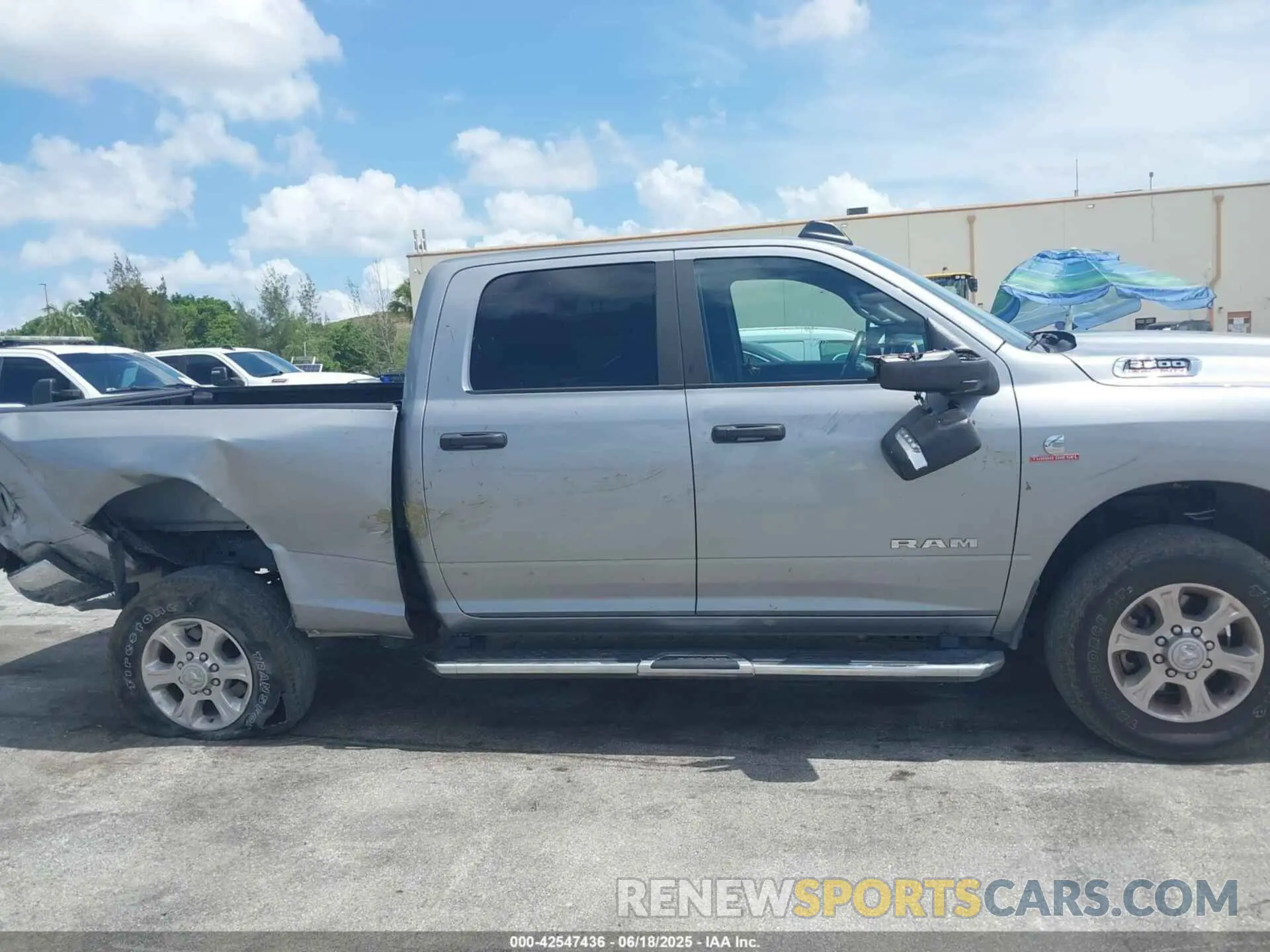 13 Photograph of a damaged car 3C6UR5DL9RG348839 RAM 2500 2024