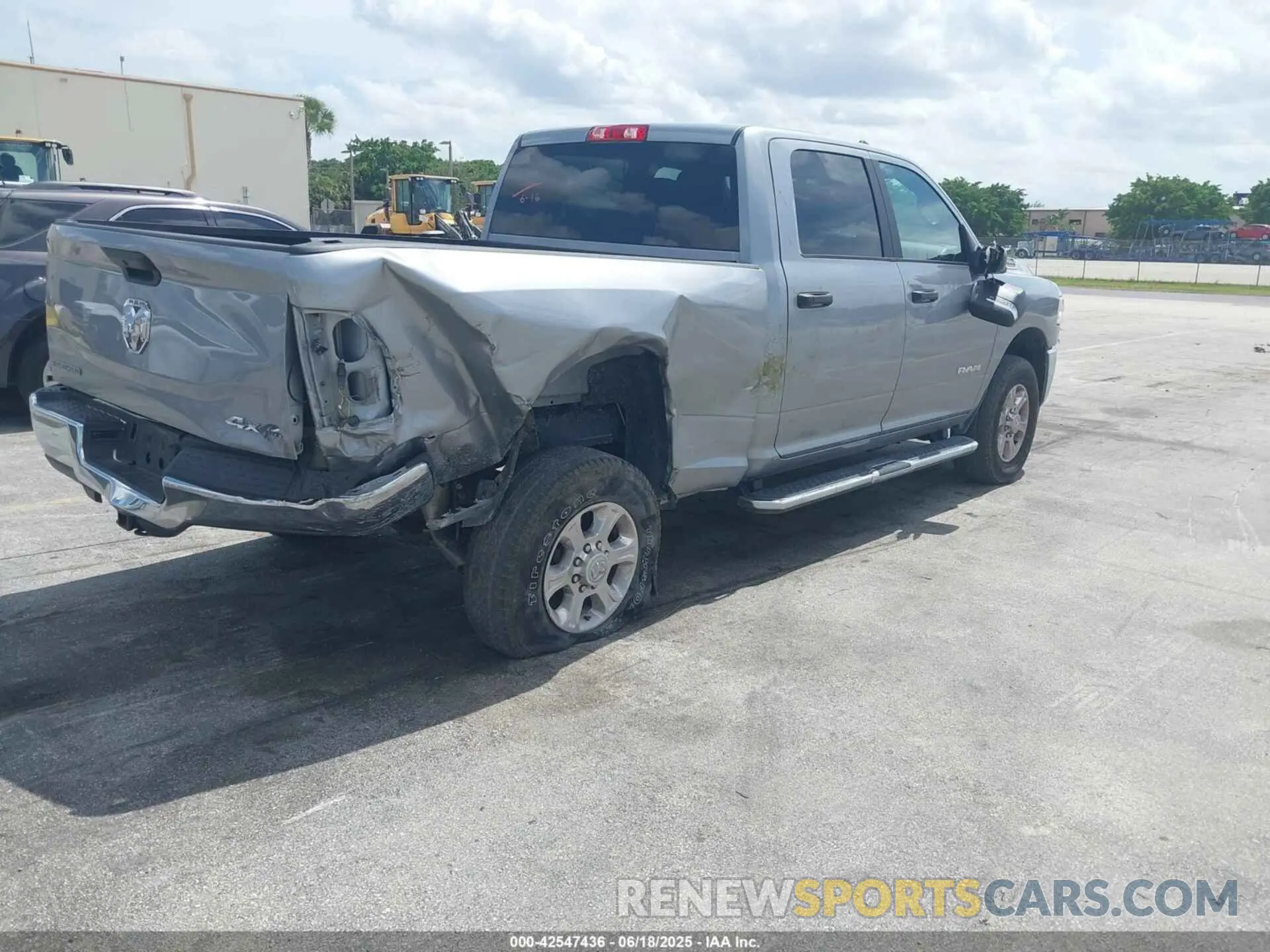 4 Photograph of a damaged car 3C6UR5DL9RG348839 RAM 2500 2024