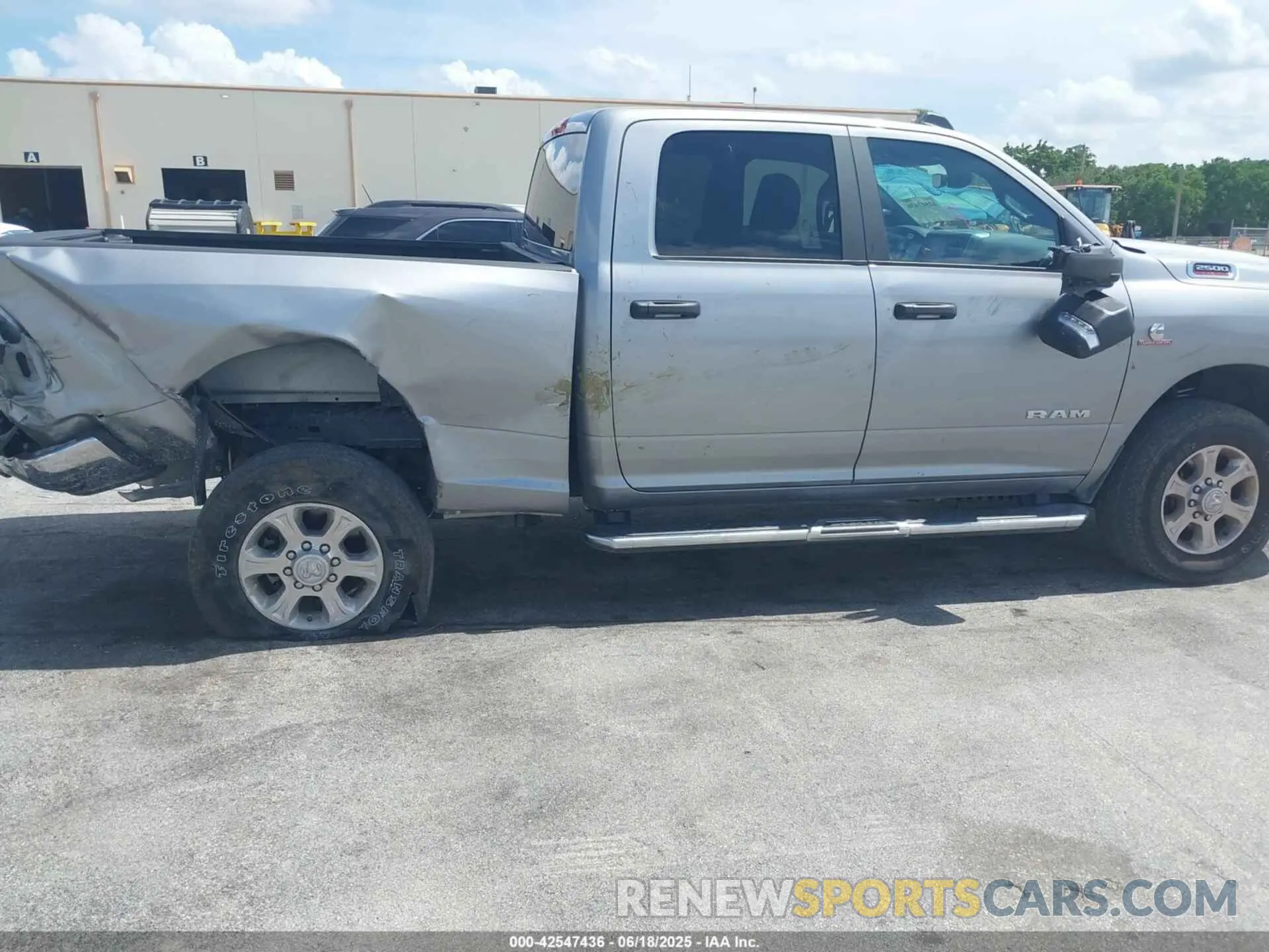 6 Photograph of a damaged car 3C6UR5DL9RG348839 RAM 2500 2024