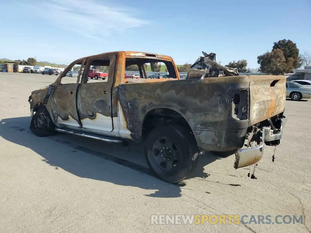 2 Photograph of a damaged car 3C6UR5DLXRG176742 RAM 2500 2024