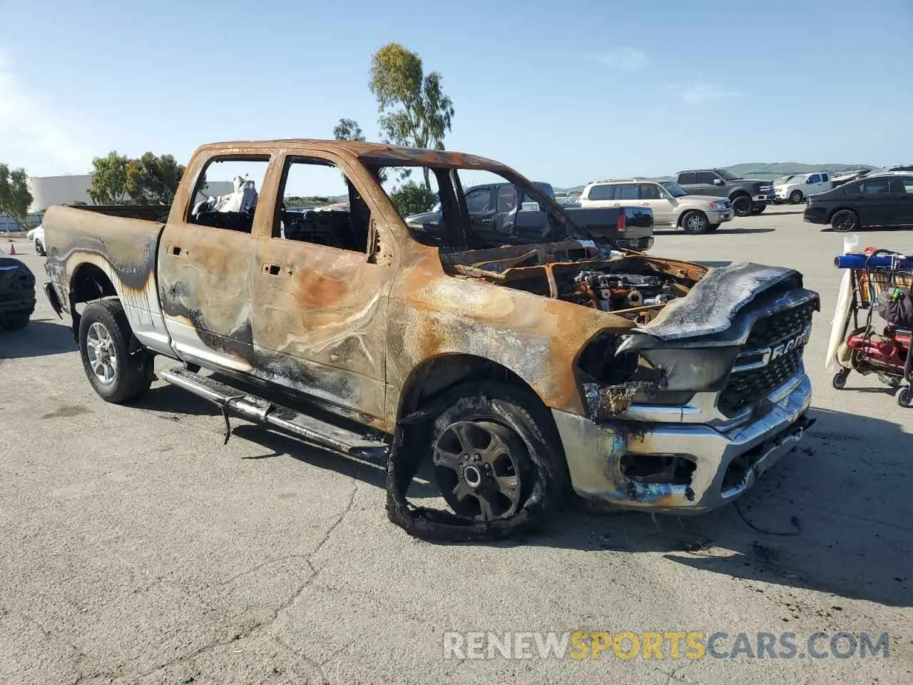 4 Photograph of a damaged car 3C6UR5DLXRG176742 RAM 2500 2024