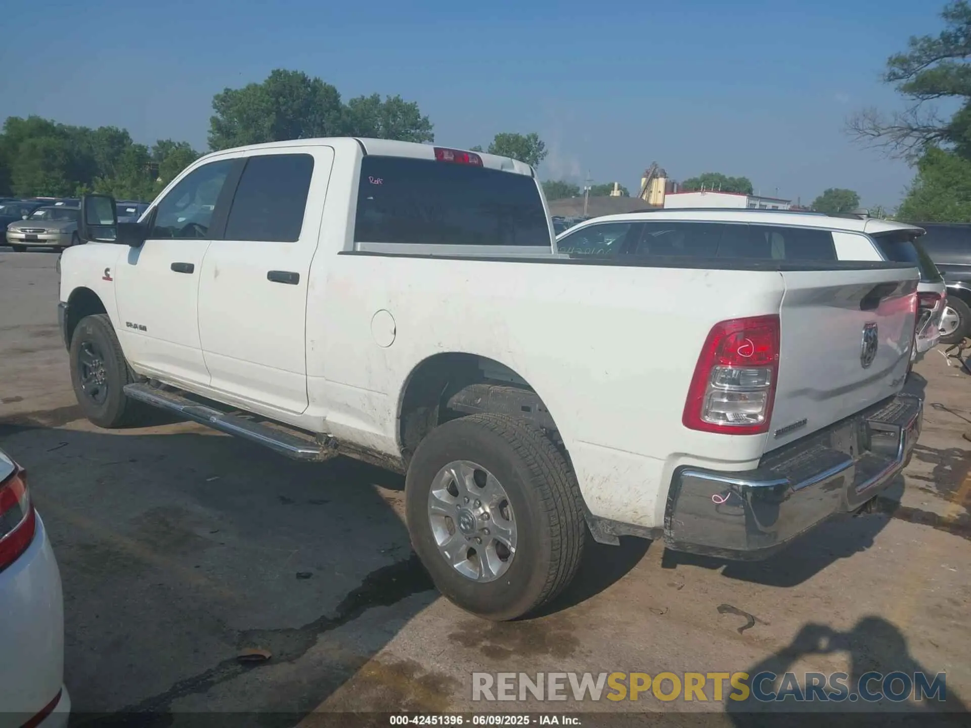 3 Photograph of a damaged car 3C6UR5DLXRG338711 RAM 2500 2024
