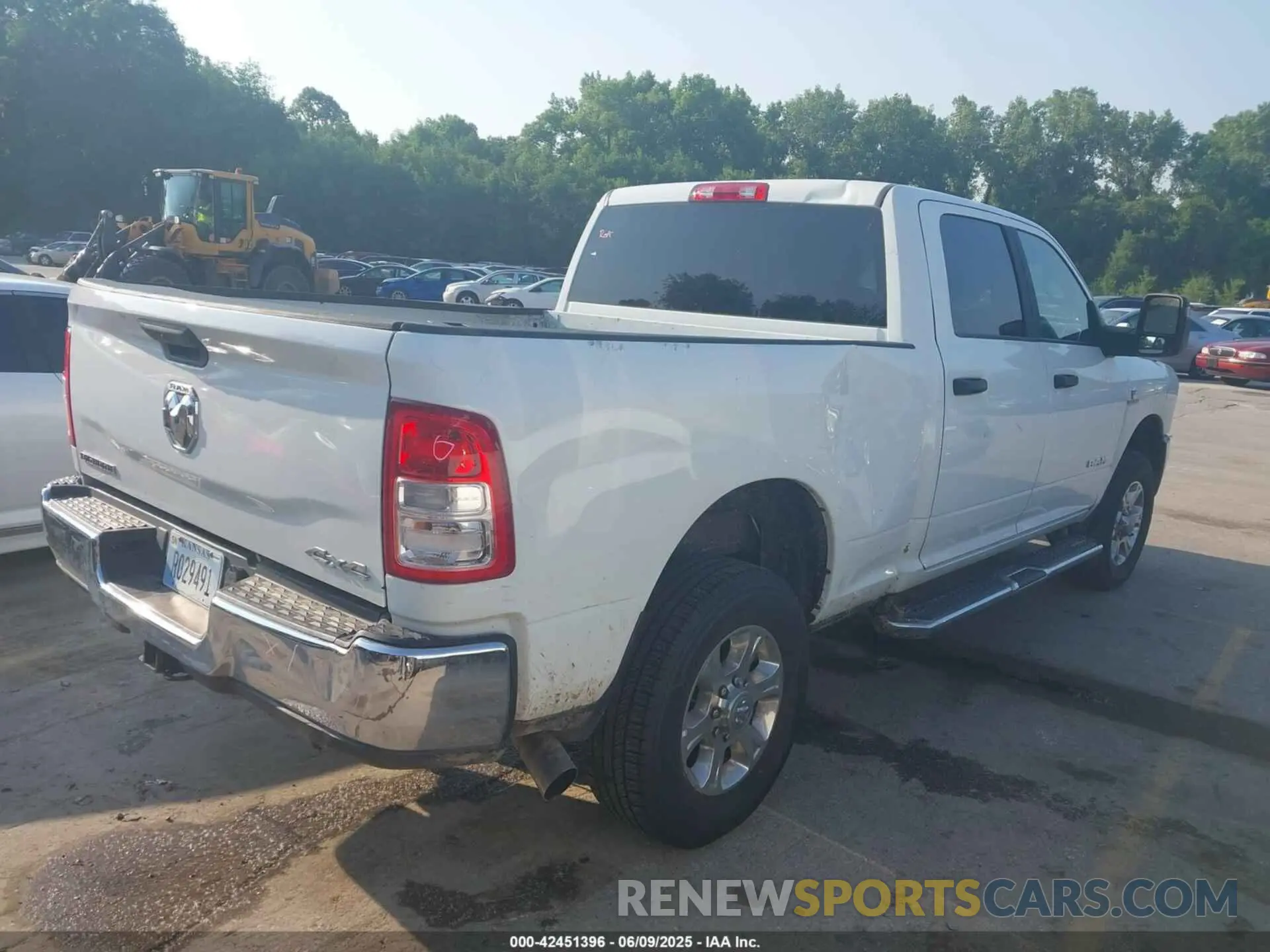 4 Photograph of a damaged car 3C6UR5DLXRG338711 RAM 2500 2024