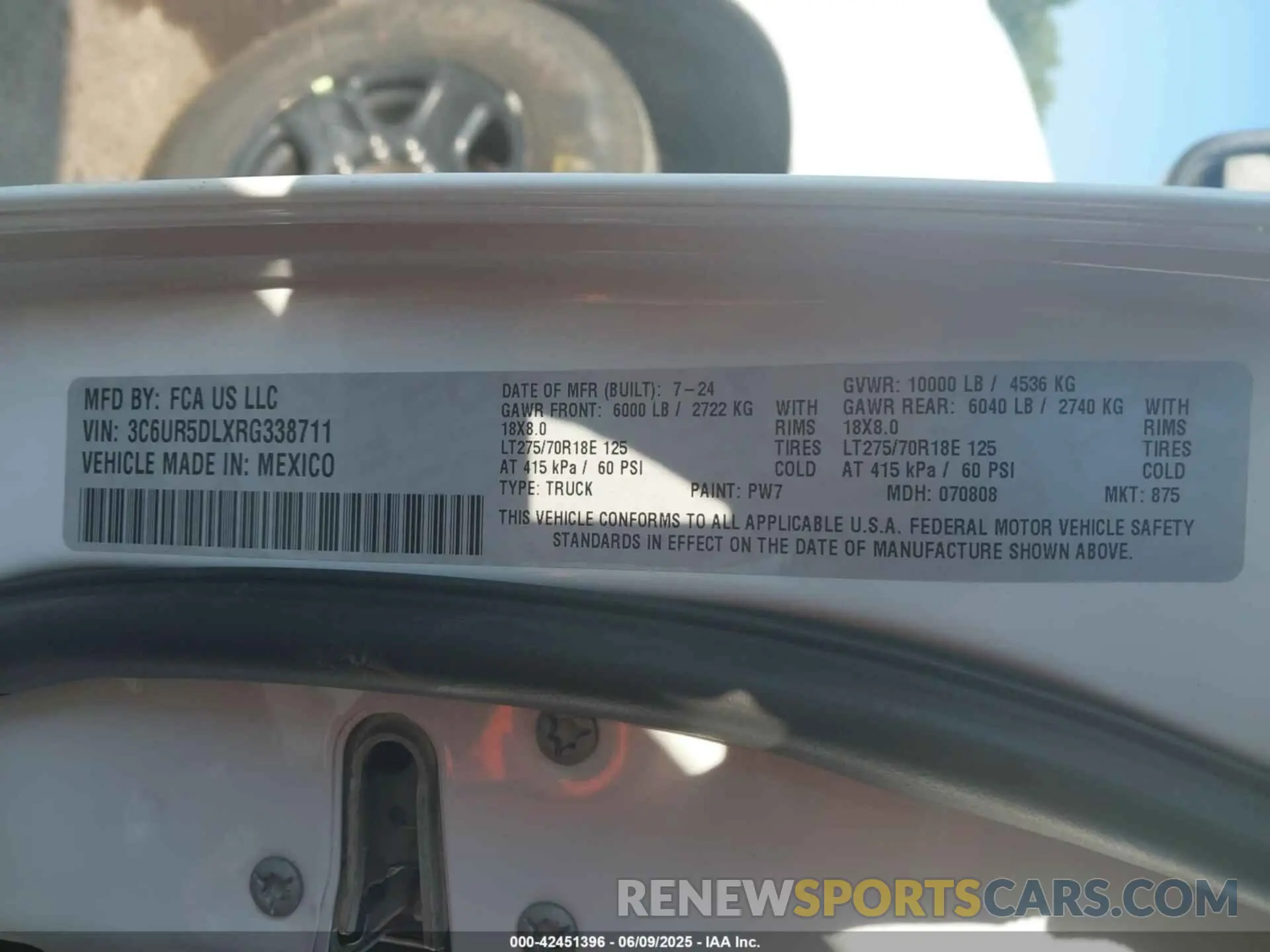 9 Photograph of a damaged car 3C6UR5DLXRG338711 RAM 2500 2024
