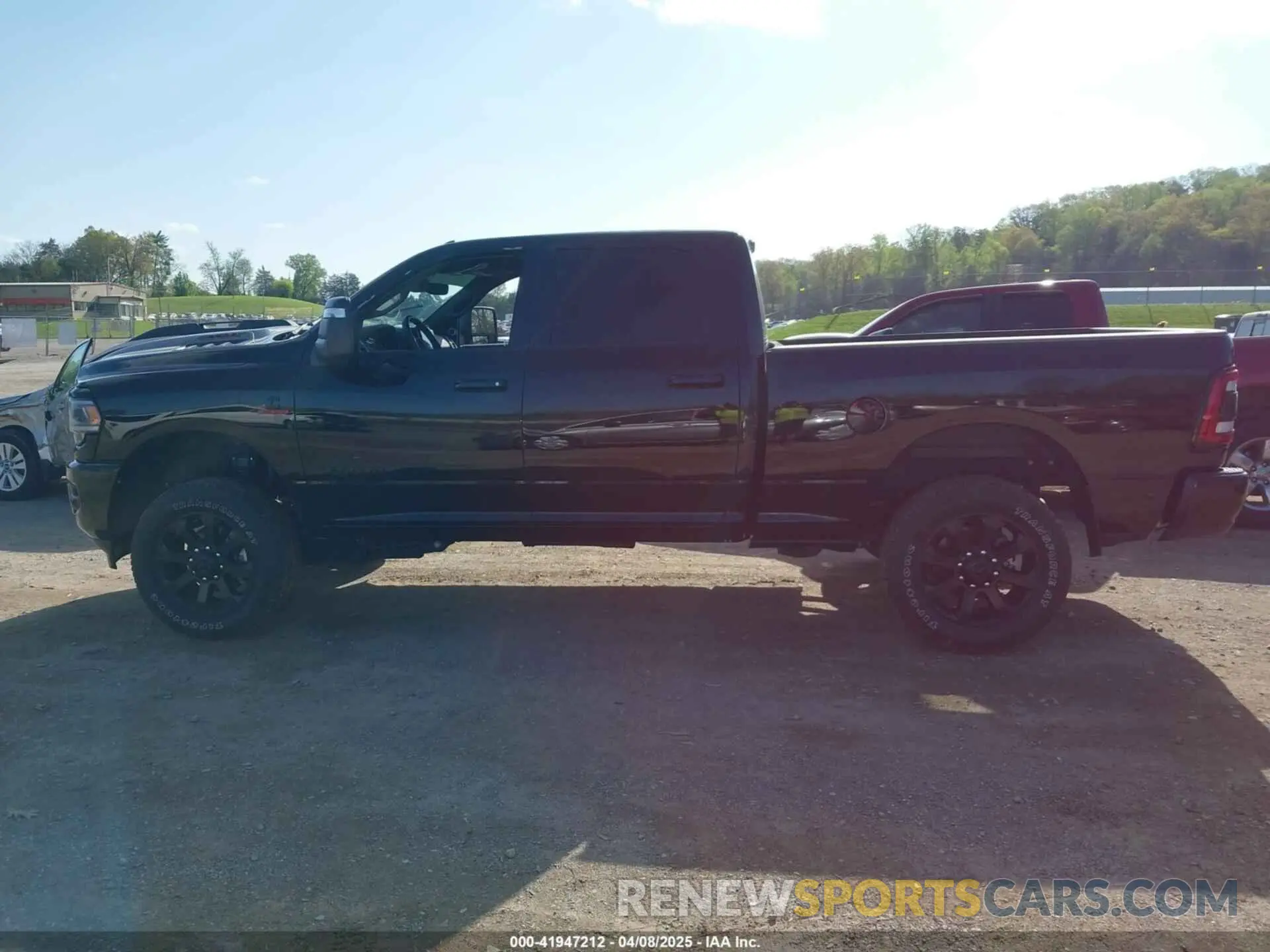 14 Photograph of a damaged car 3C6UR5FL4RG112791 RAM 2500 2024