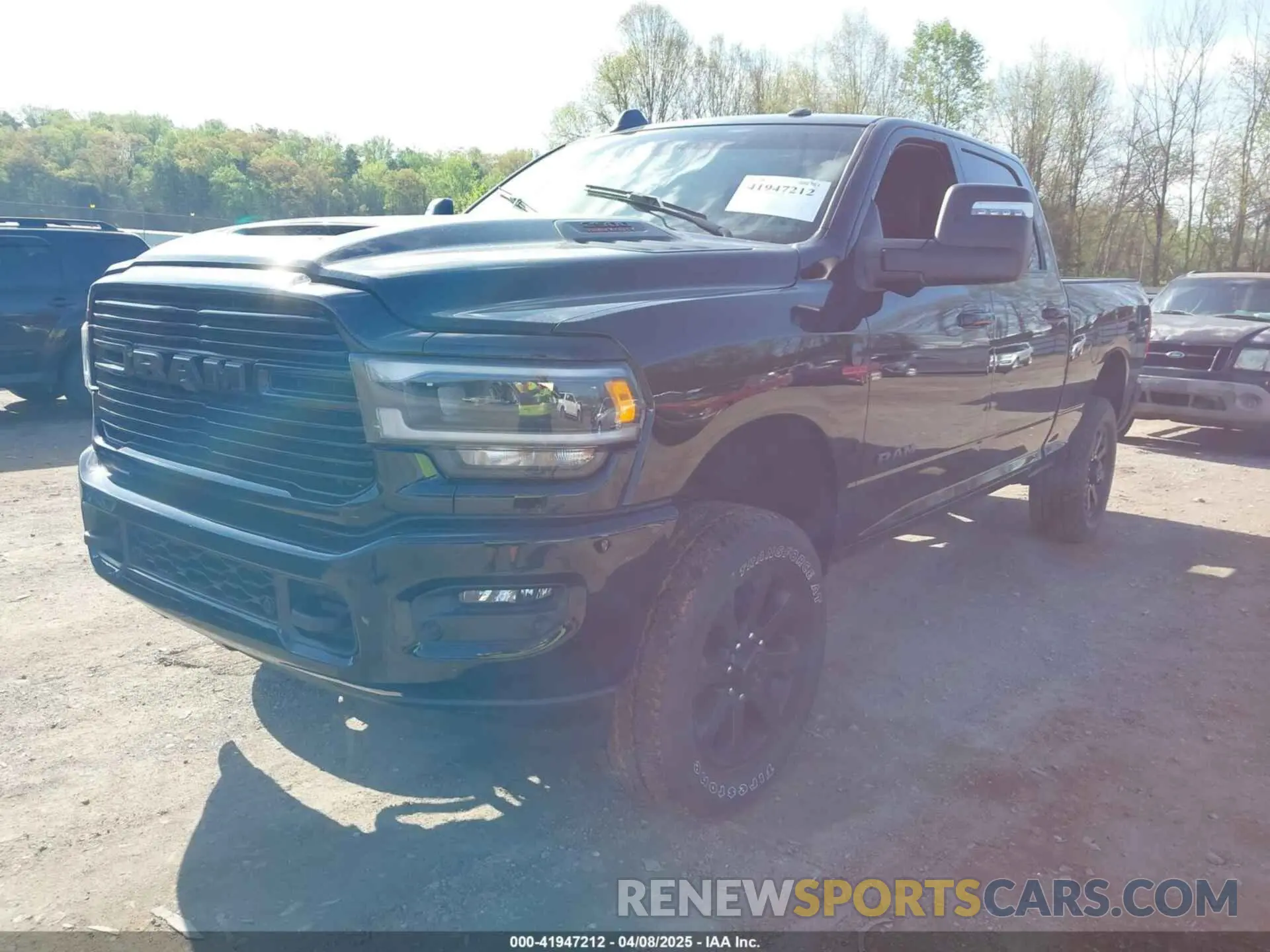 2 Photograph of a damaged car 3C6UR5FL4RG112791 RAM 2500 2024