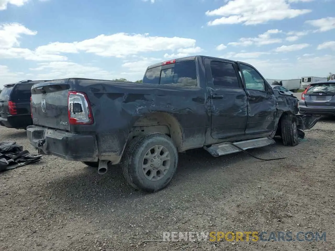 3 Photograph of a damaged car 3C6UR5FL6RG159952 RAM 2500 2024