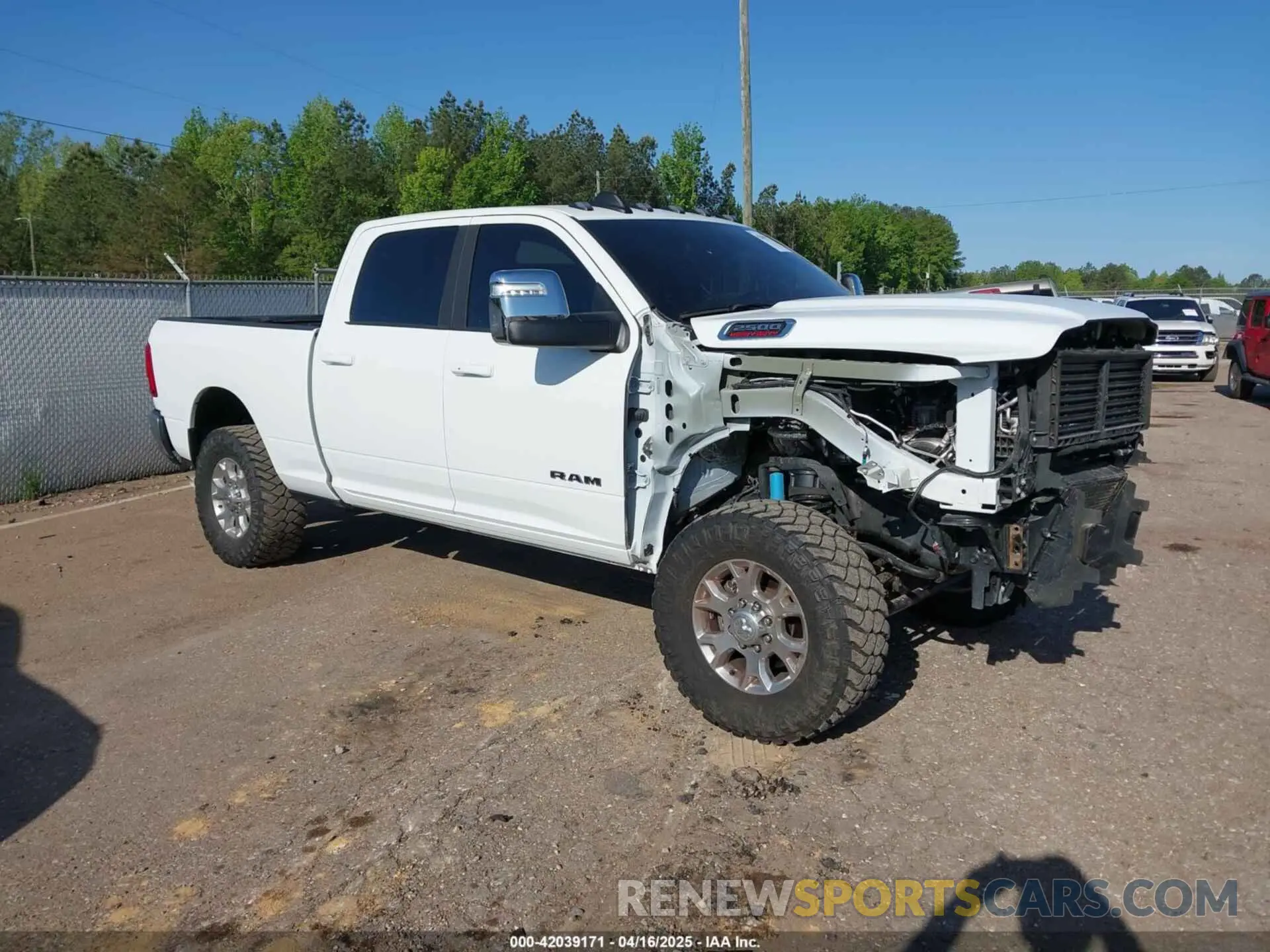 1 Photograph of a damaged car 3C6UR5FL6RG181448 RAM 2500 2024