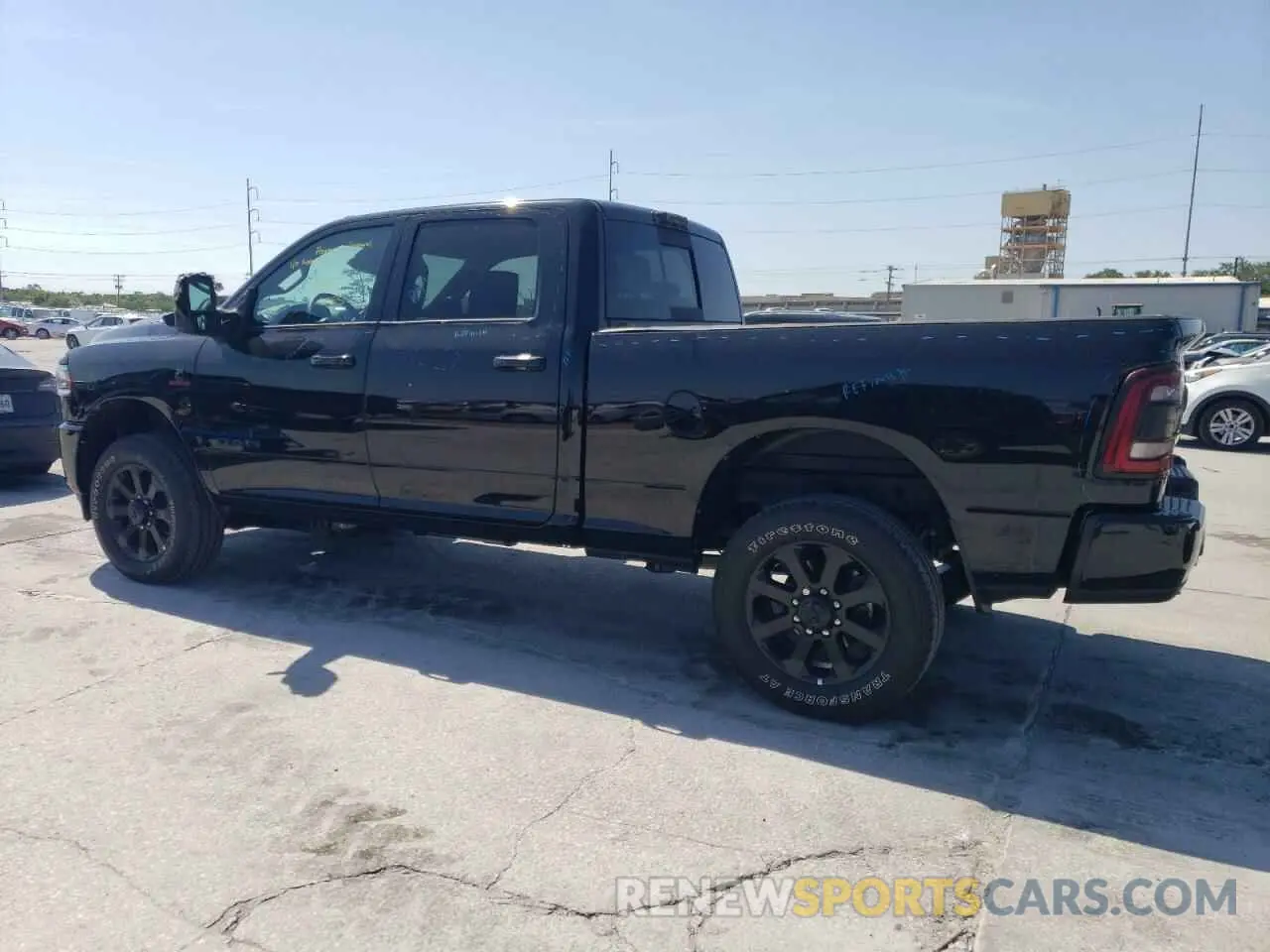 2 Photograph of a damaged car 3C6UR5FLXRG364108 RAM 2500 2024