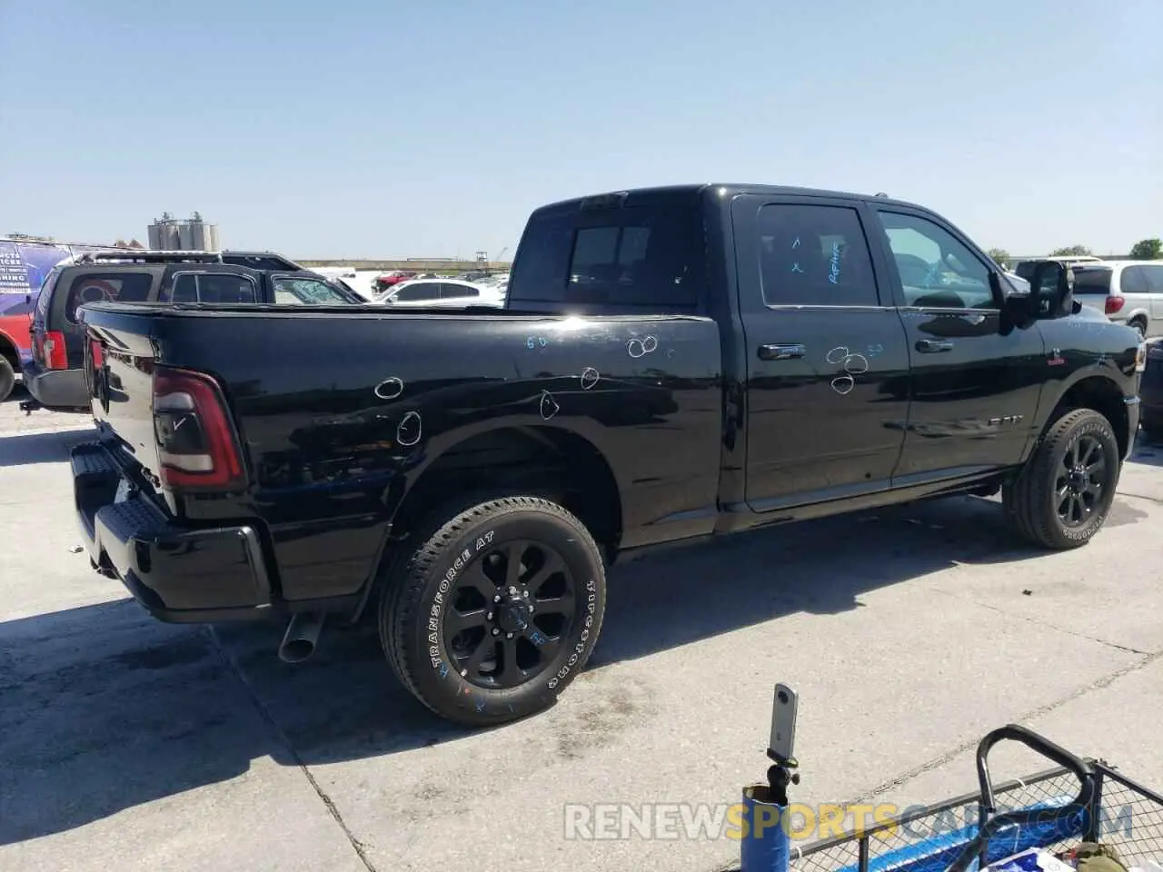 3 Photograph of a damaged car 3C6UR5FLXRG364108 RAM 2500 2024