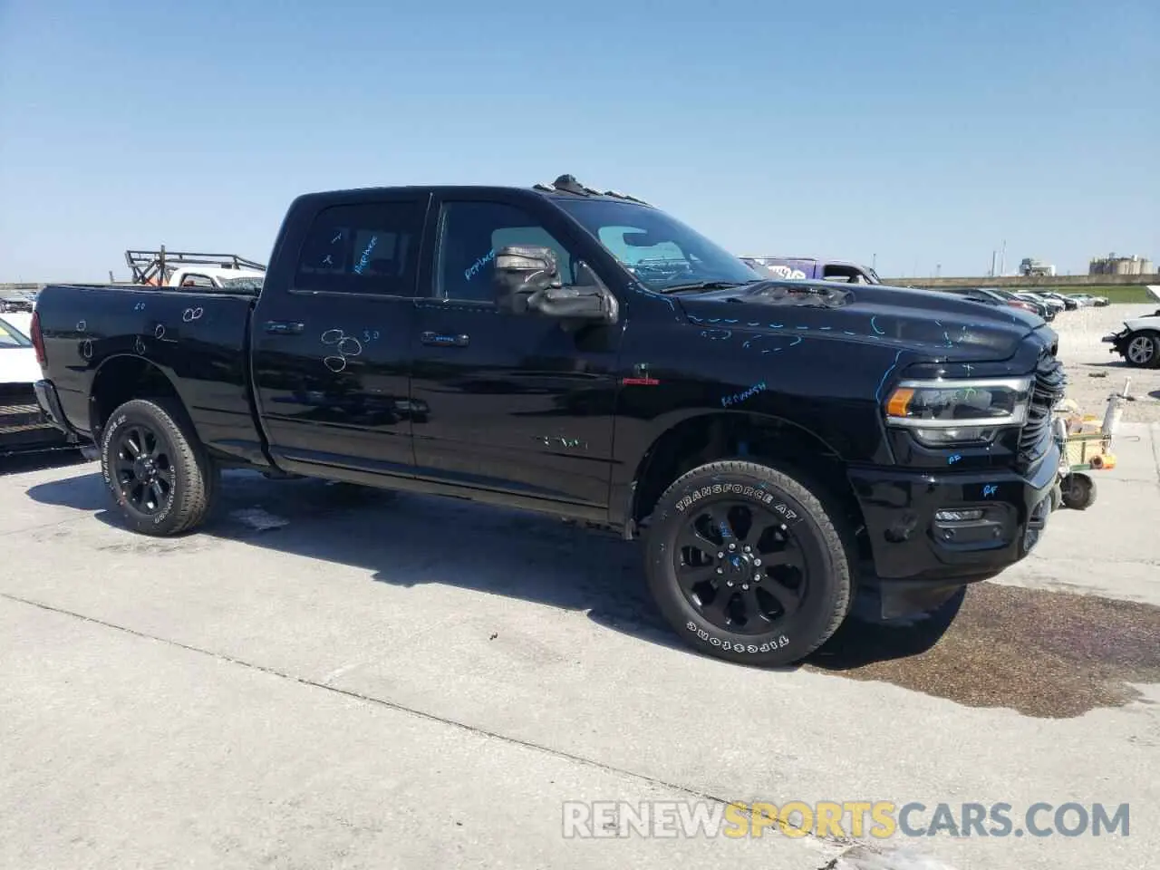 4 Photograph of a damaged car 3C6UR5FLXRG364108 RAM 2500 2024