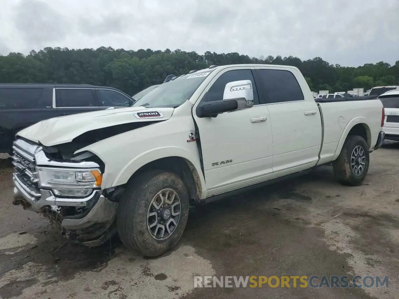 1 Photograph of a damaged car 3C6UR5GL4RG127824 RAM 2500 2024