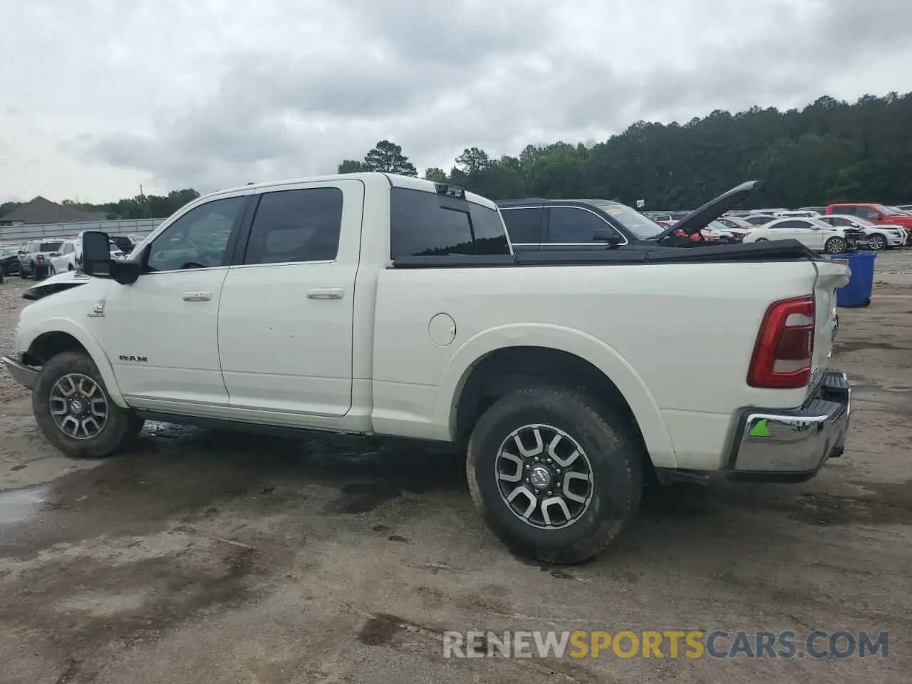2 Photograph of a damaged car 3C6UR5GL4RG127824 RAM 2500 2024