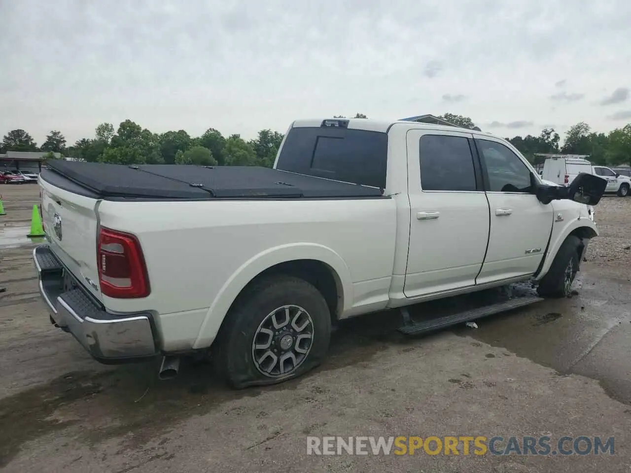 3 Photograph of a damaged car 3C6UR5GL4RG127824 RAM 2500 2024