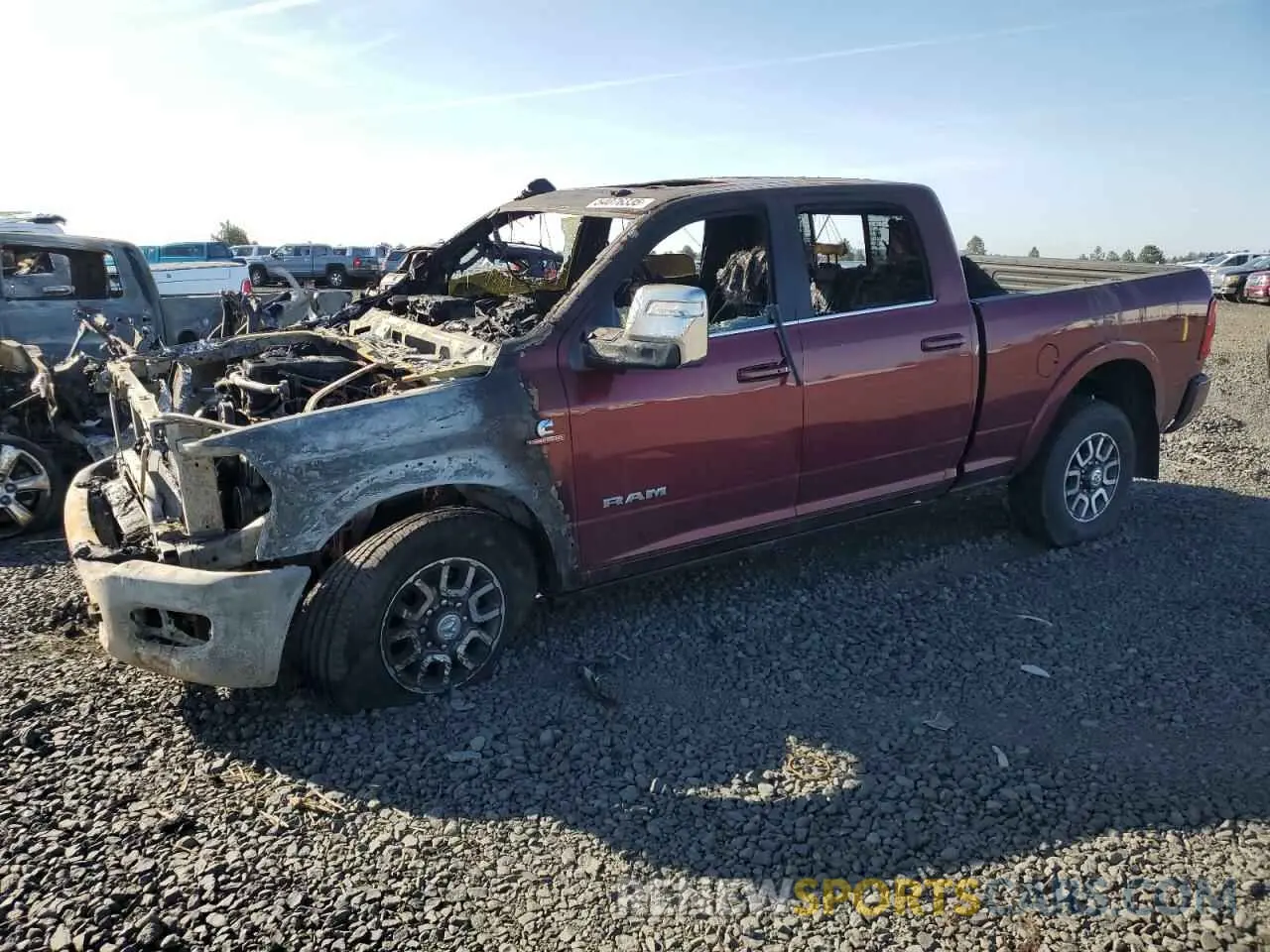 1 Photograph of a damaged car 3C6UR5GL4RG253584 RAM 2500 2024