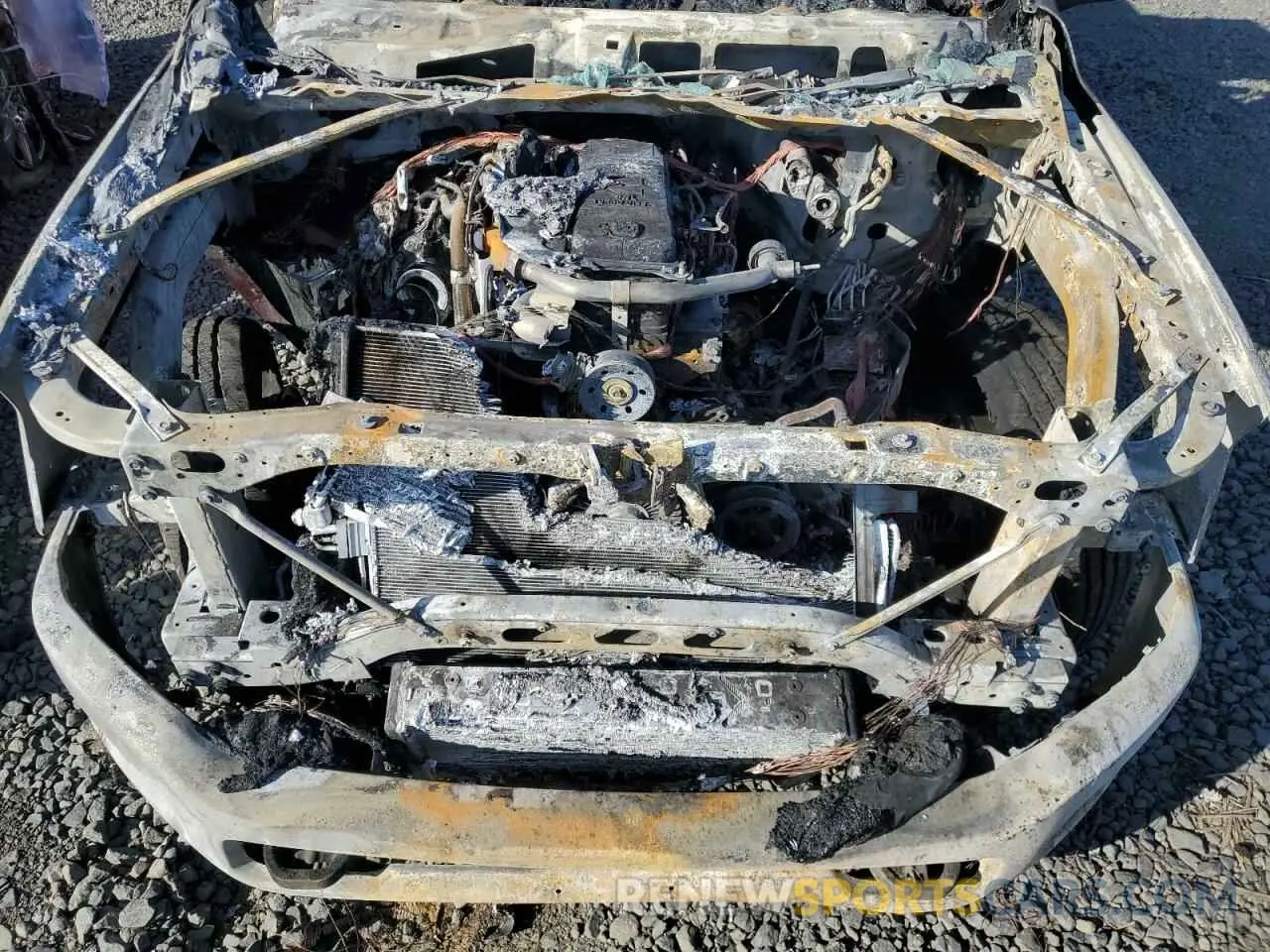 11 Photograph of a damaged car 3C6UR5GL4RG253584 RAM 2500 2024
