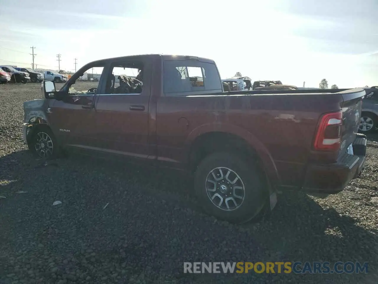 2 Photograph of a damaged car 3C6UR5GL4RG253584 RAM 2500 2024