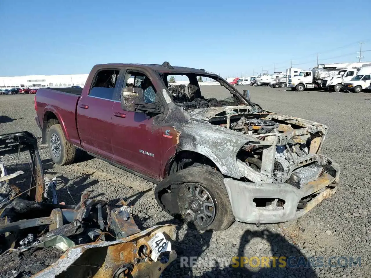 4 Photograph of a damaged car 3C6UR5GL4RG253584 RAM 2500 2024