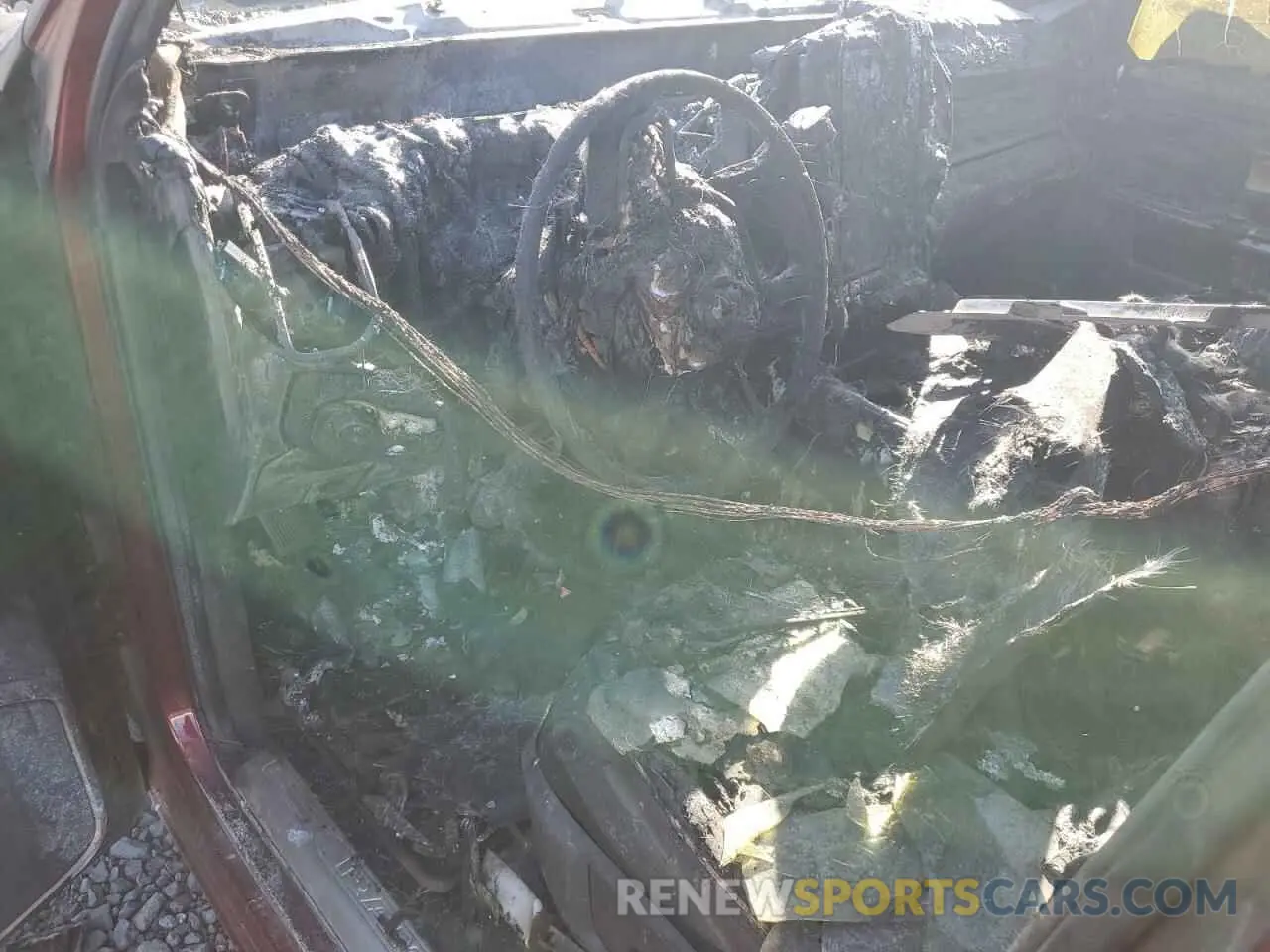 8 Photograph of a damaged car 3C6UR5GL4RG253584 RAM 2500 2024