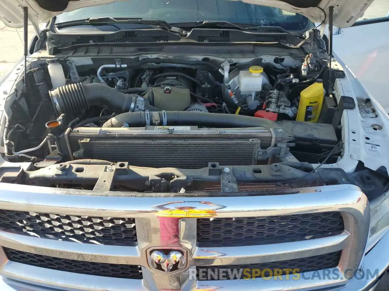11 Photograph of a damaged car 3C6UR5HJ2RG230415 RAM 2500 2024