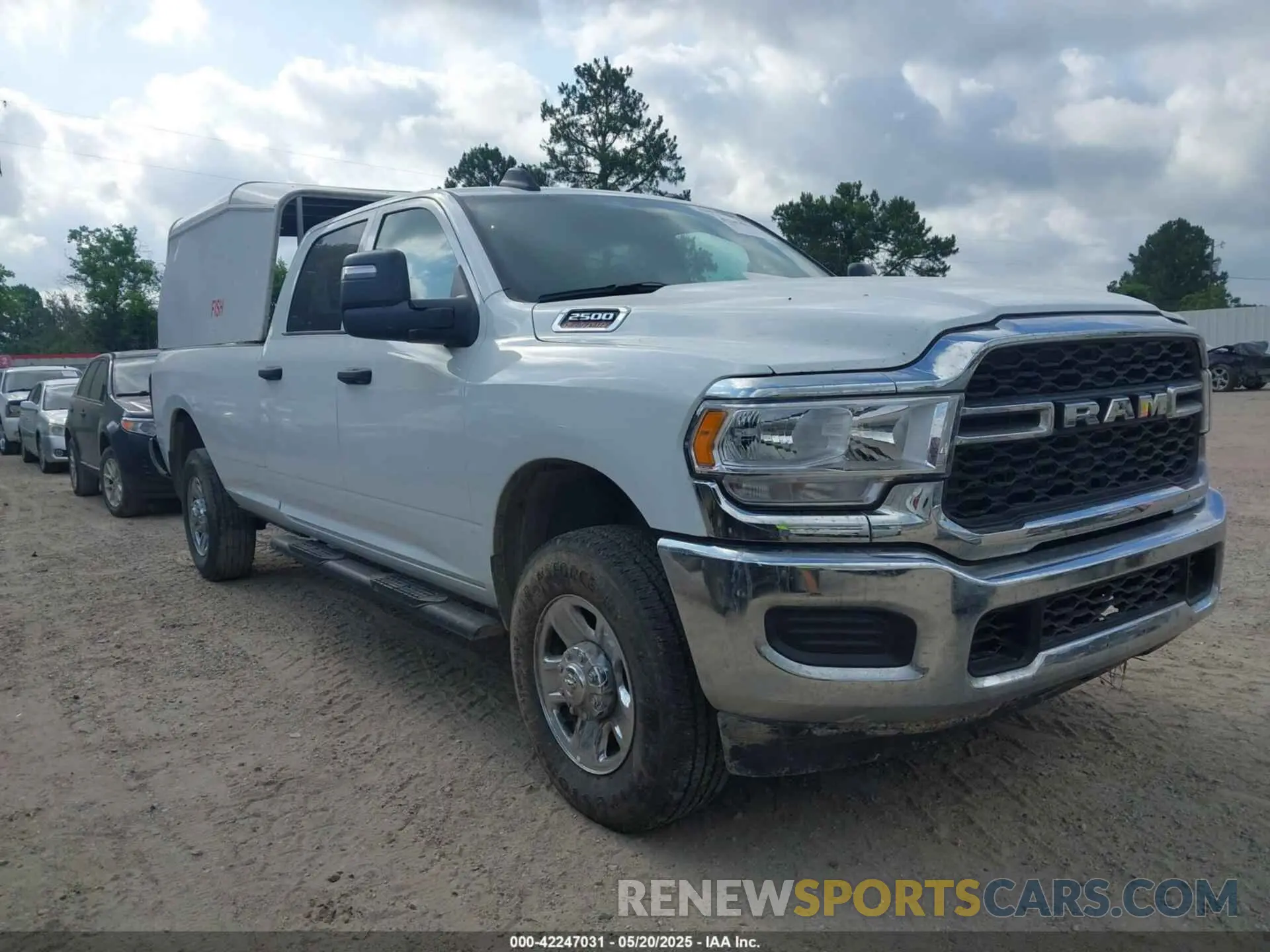 1 Photograph of a damaged car 3C6UR5HJ2RG234917 RAM 2500 2024