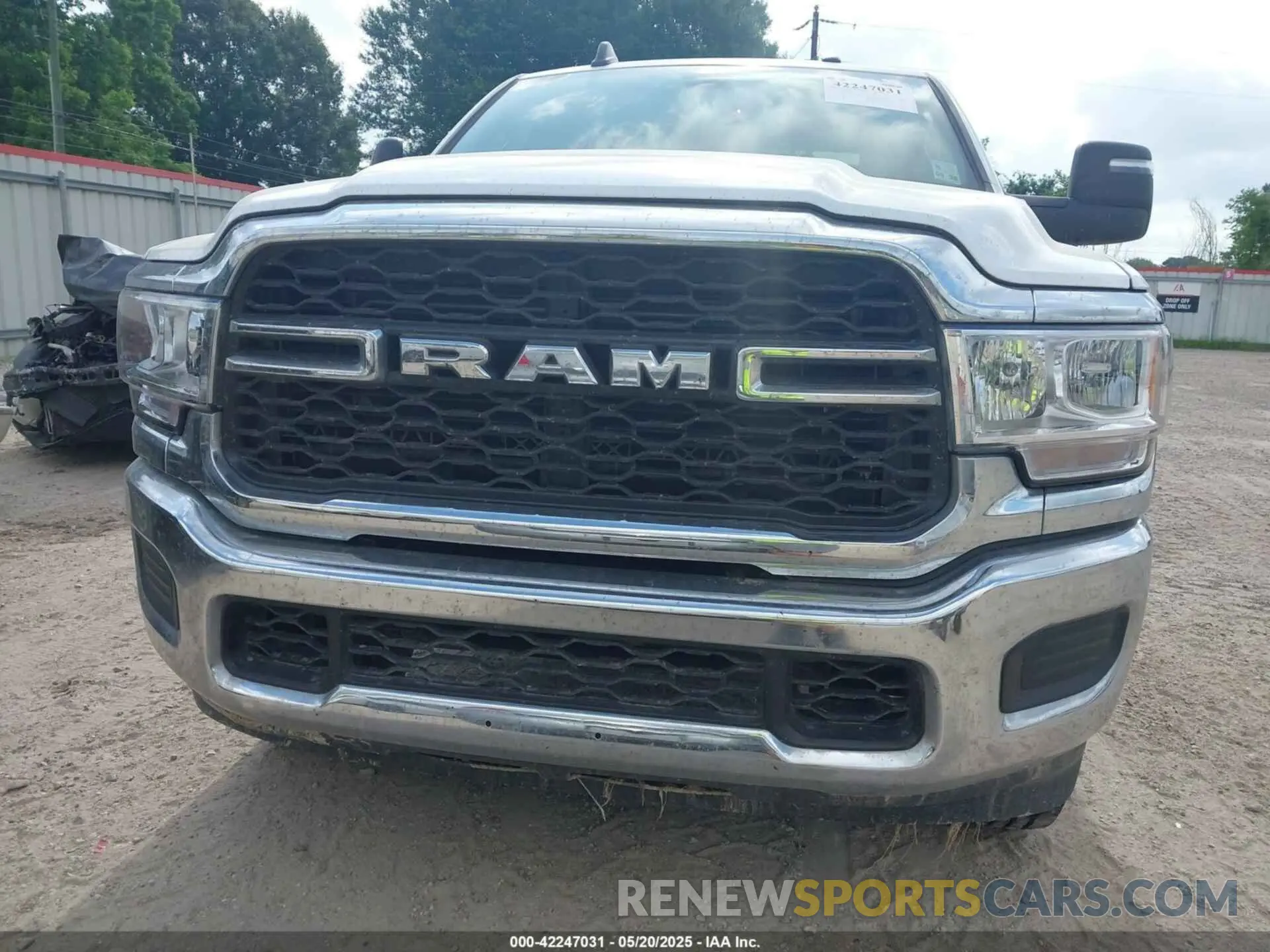 12 Photograph of a damaged car 3C6UR5HJ2RG234917 RAM 2500 2024