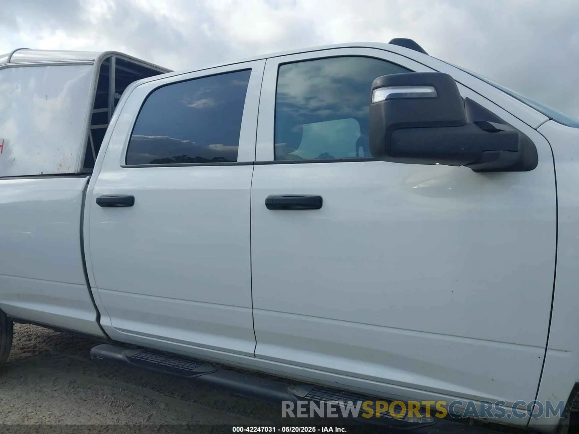 13 Photograph of a damaged car 3C6UR5HJ2RG234917 RAM 2500 2024