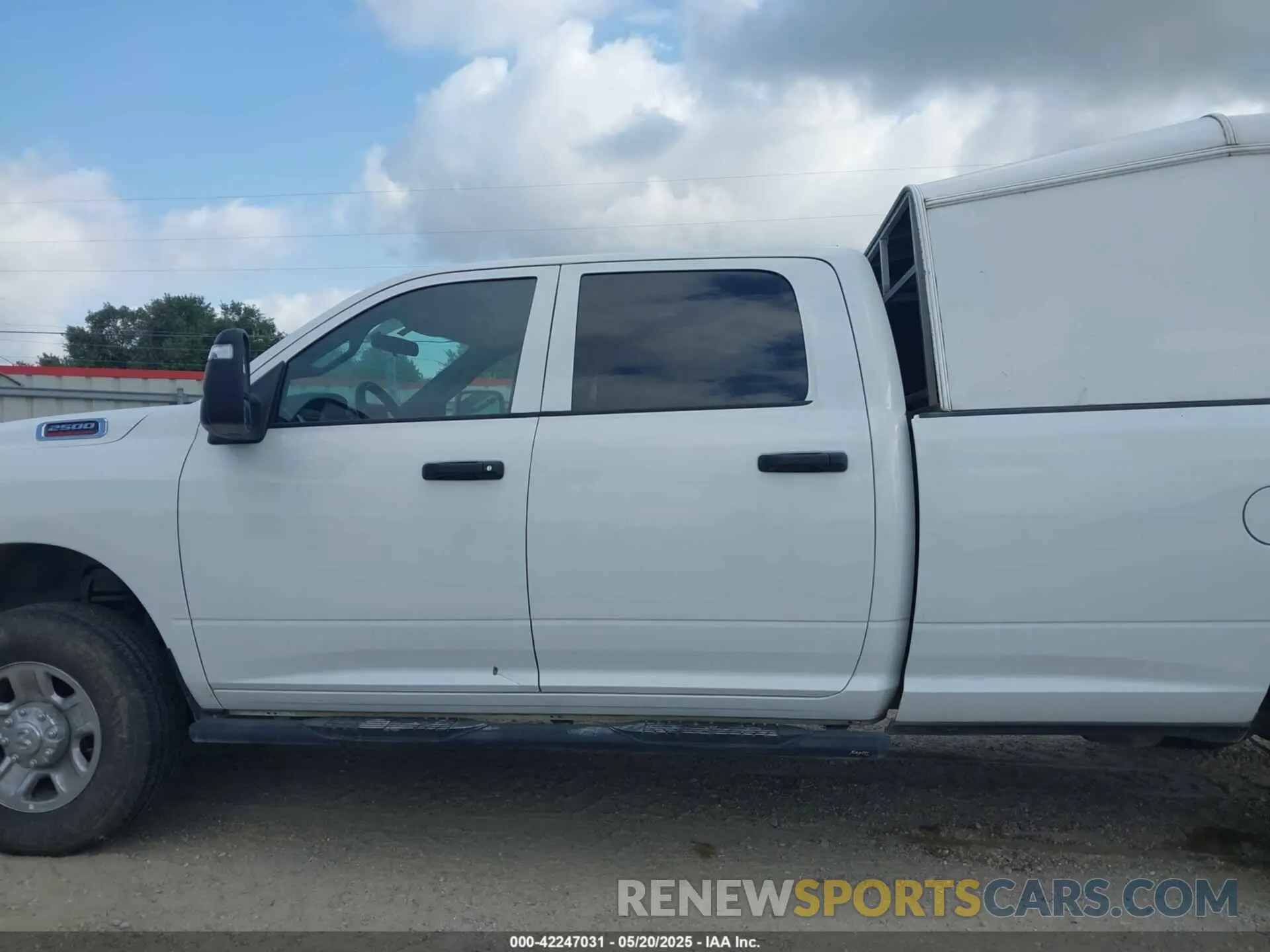 14 Photograph of a damaged car 3C6UR5HJ2RG234917 RAM 2500 2024