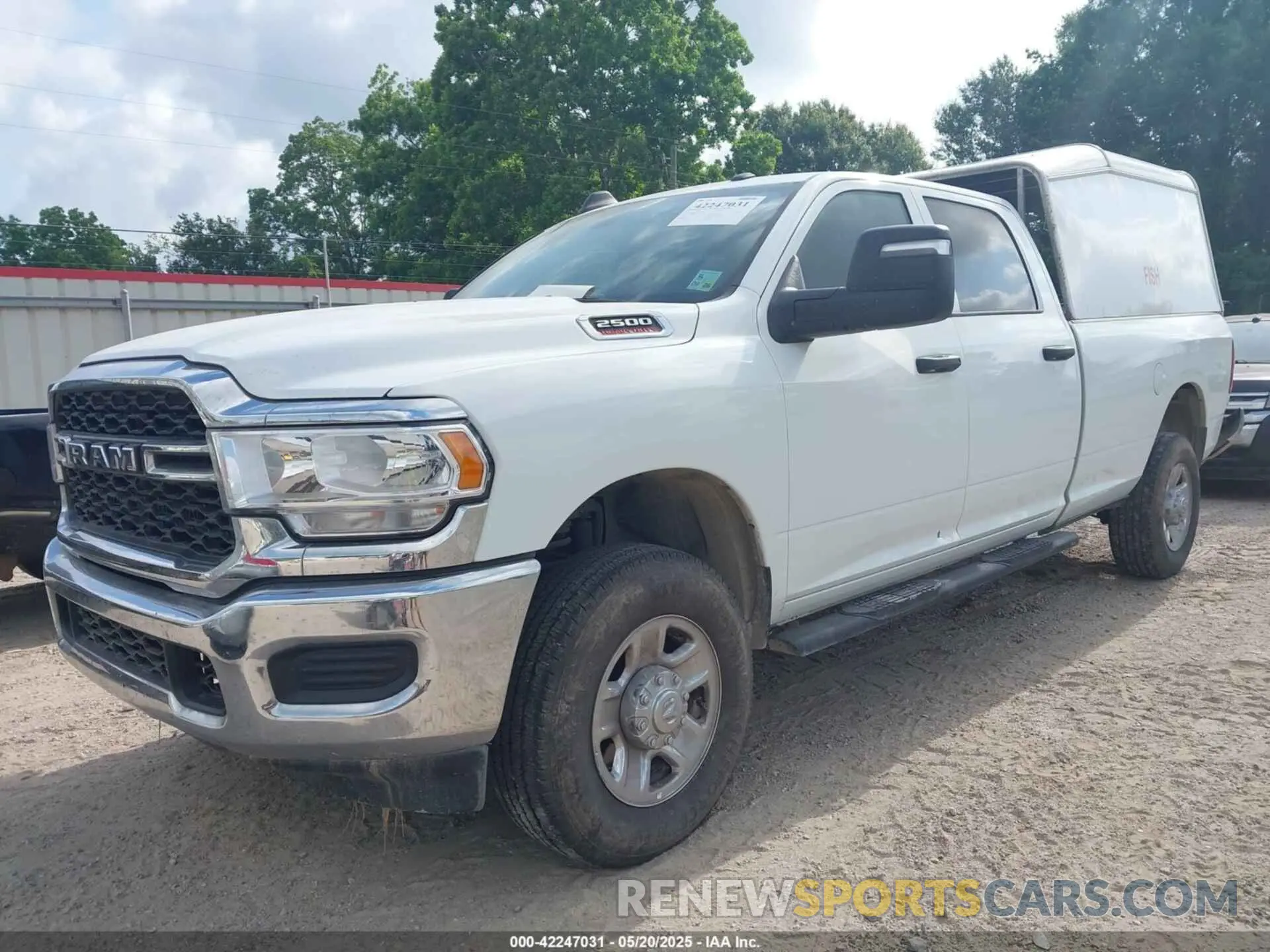 2 Photograph of a damaged car 3C6UR5HJ2RG234917 RAM 2500 2024