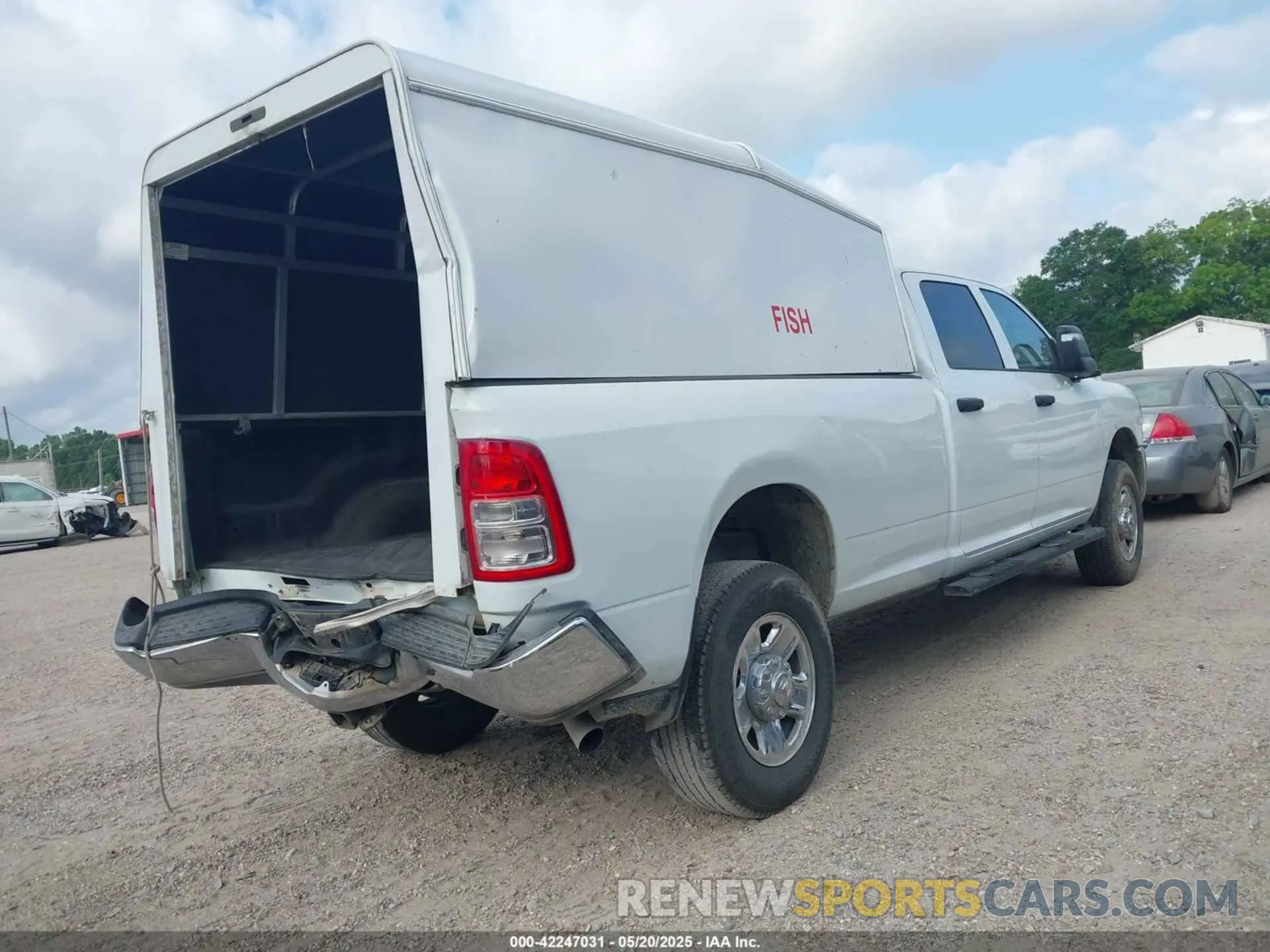 4 Photograph of a damaged car 3C6UR5HJ2RG234917 RAM 2500 2024