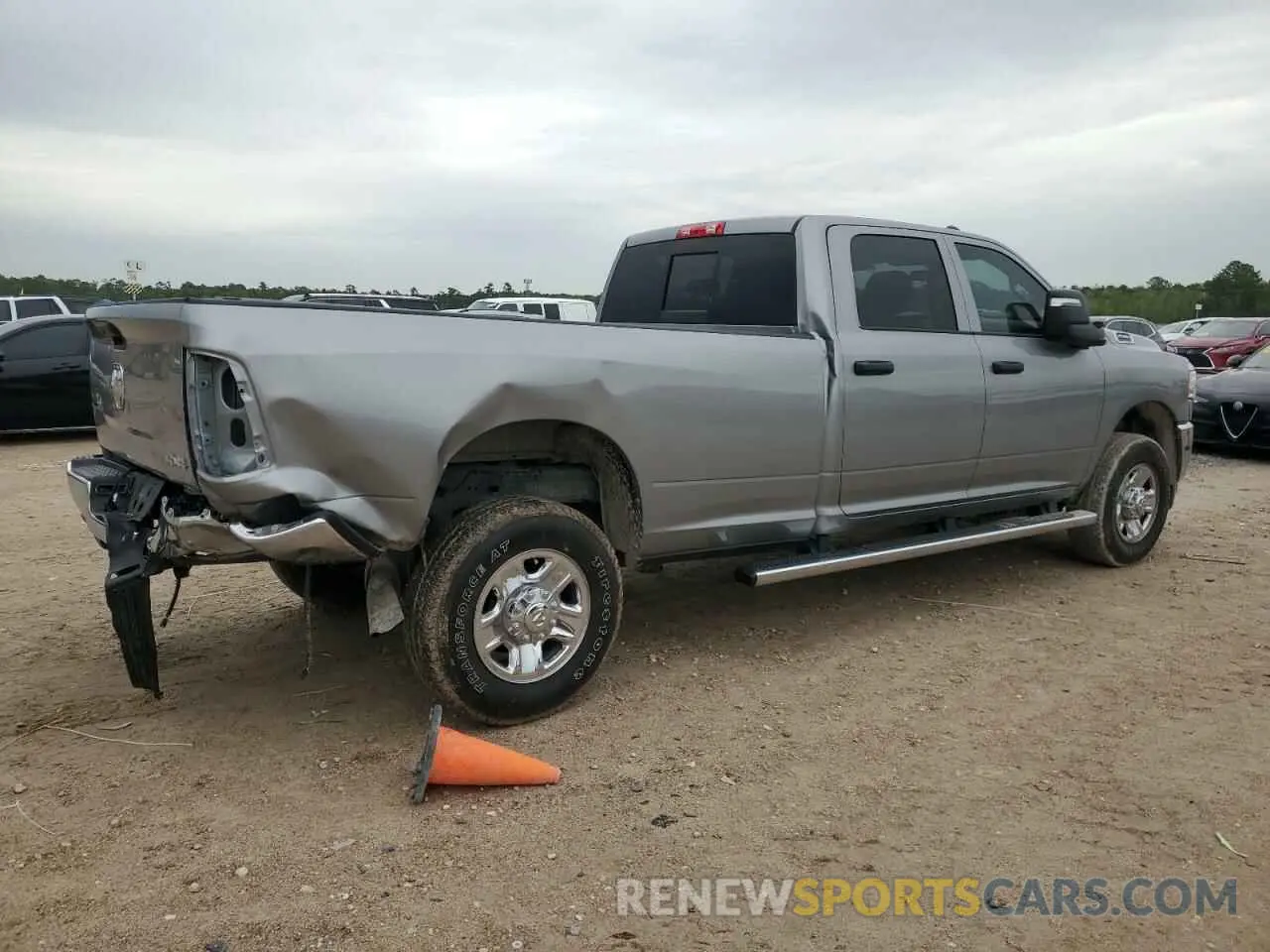3 Photograph of a damaged car 3C6UR5HJ5RG169223 RAM 2500 2024