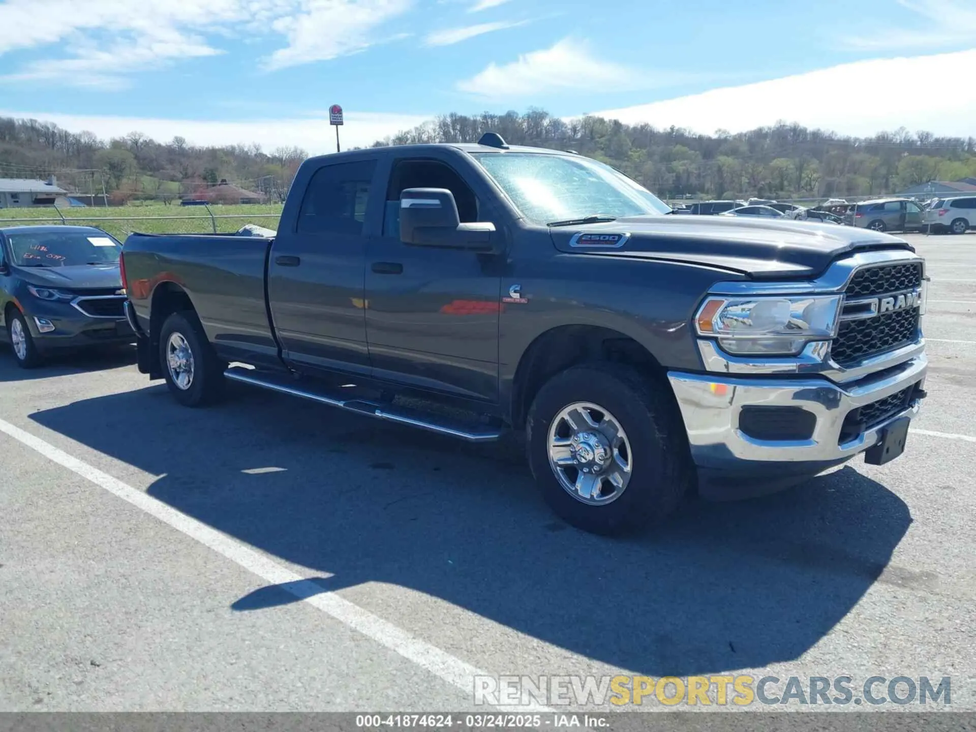 1 Photograph of a damaged car 3C6UR5HL1RG269501 RAM 2500 2024