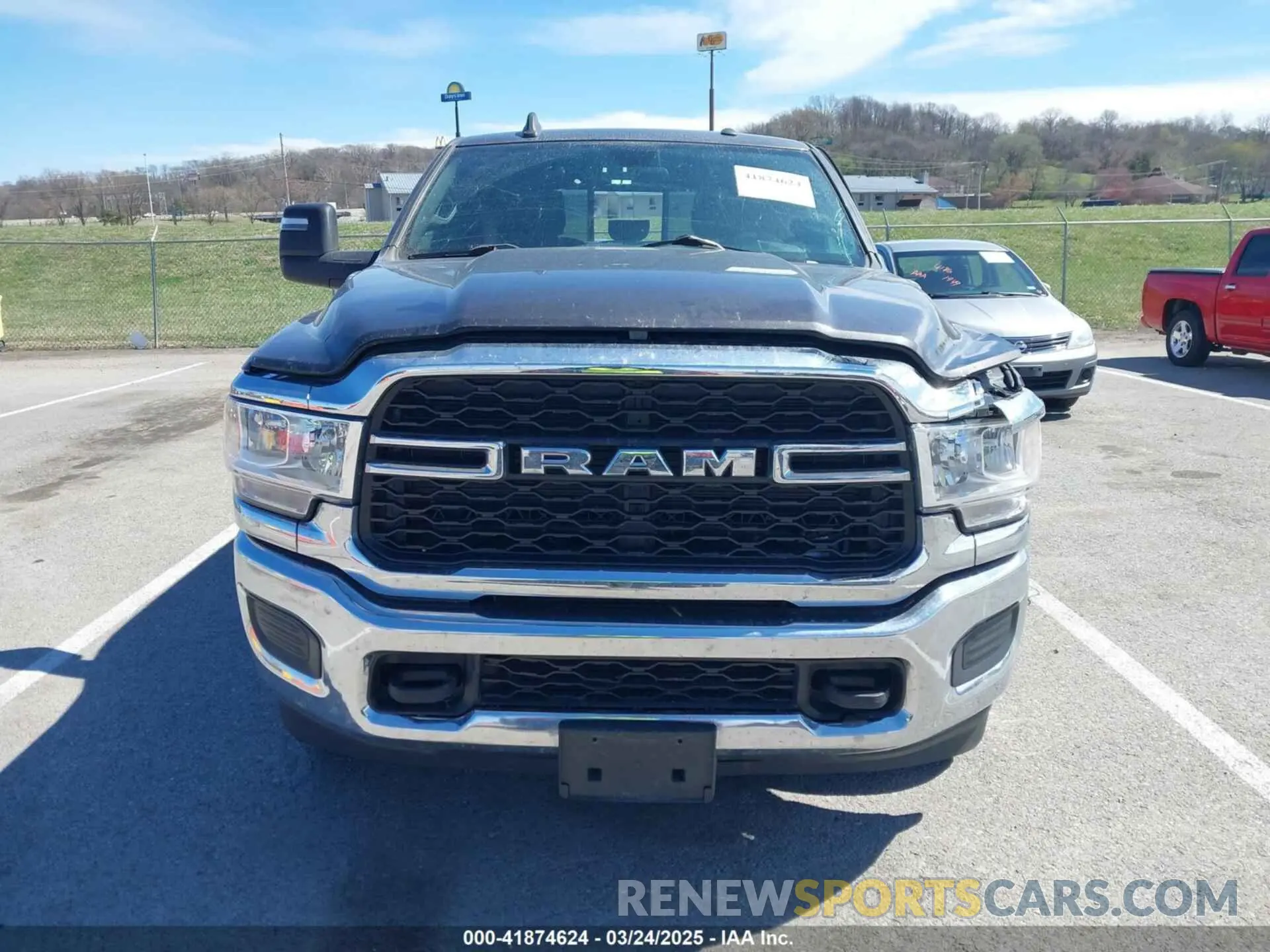 13 Photograph of a damaged car 3C6UR5HL1RG269501 RAM 2500 2024