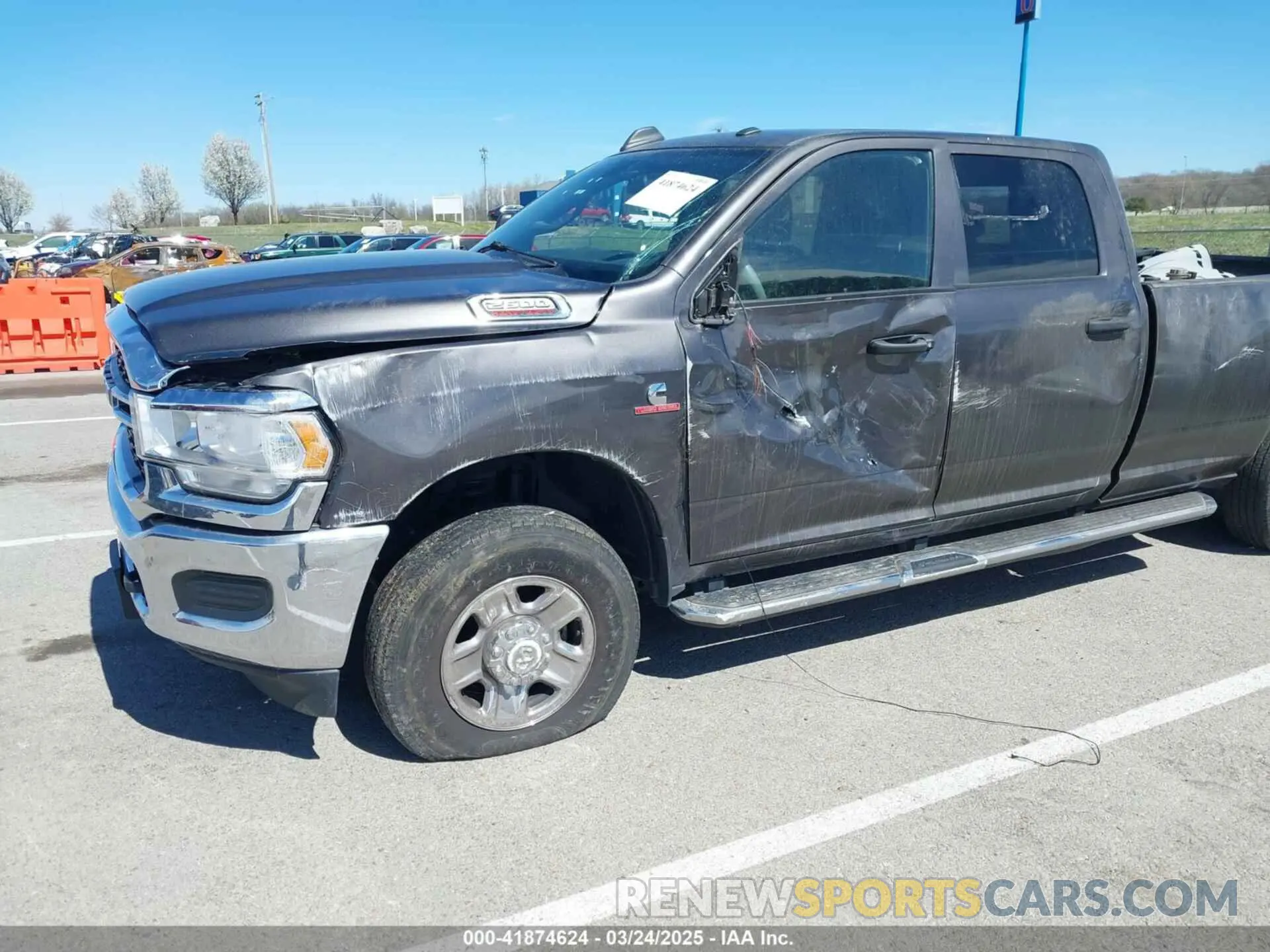 6 Photograph of a damaged car 3C6UR5HL1RG269501 RAM 2500 2024