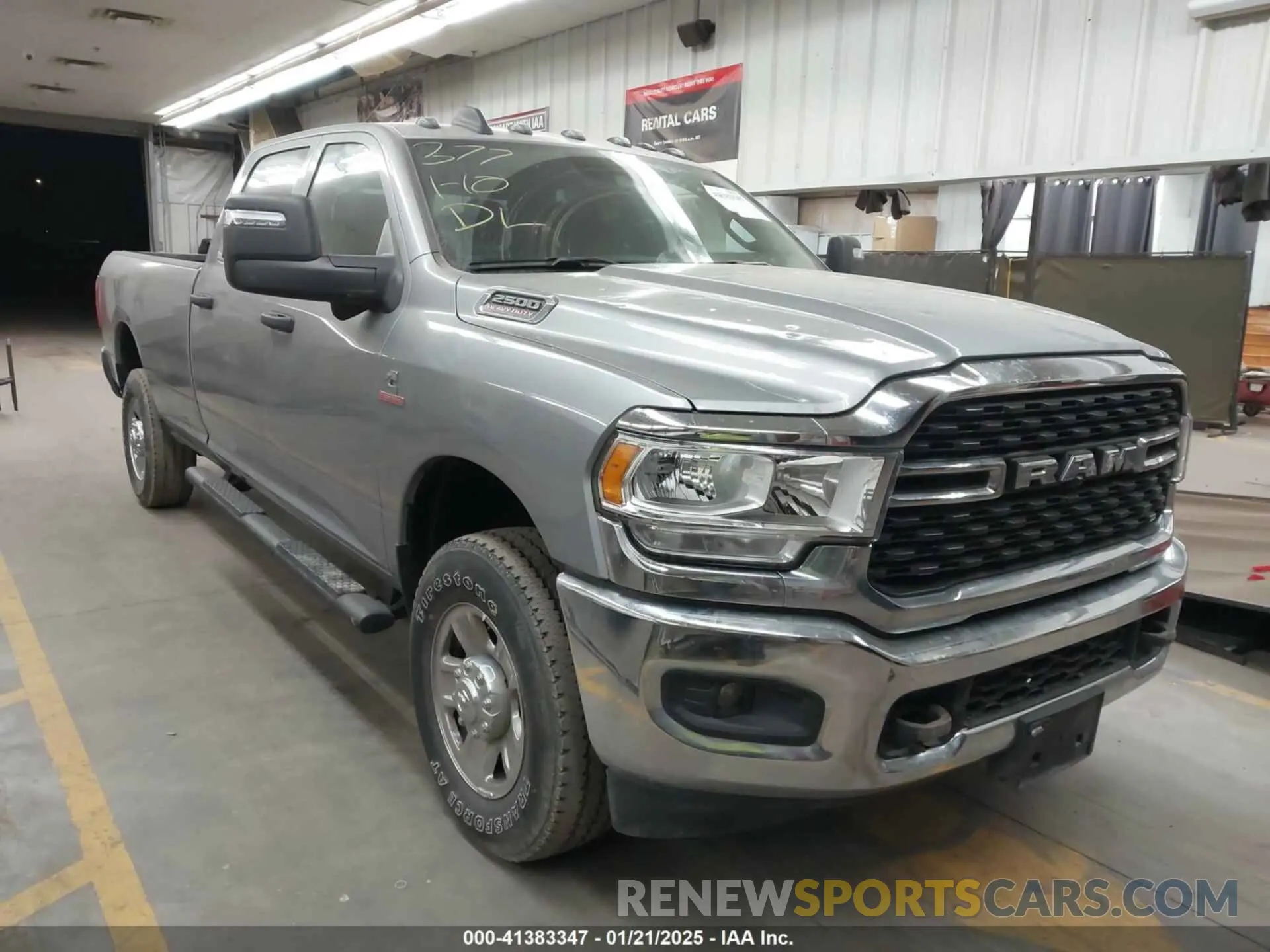 1 Photograph of a damaged car 3C6UR5HL6RG189322 RAM 2500 2024