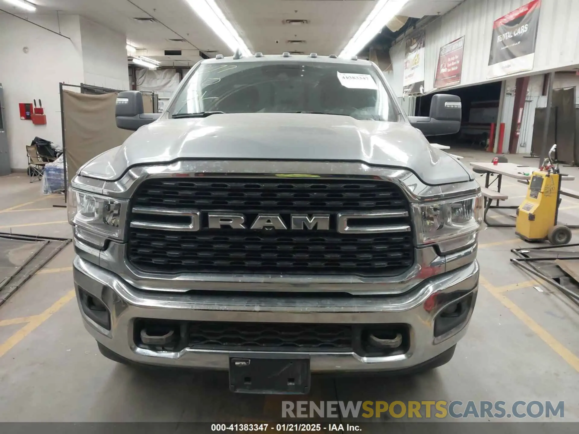 12 Photograph of a damaged car 3C6UR5HL6RG189322 RAM 2500 2024