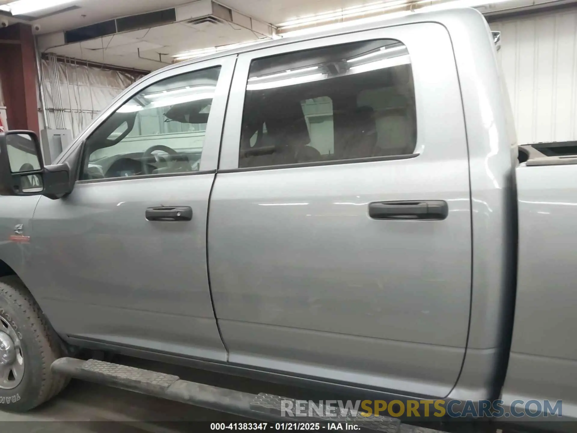 14 Photograph of a damaged car 3C6UR5HL6RG189322 RAM 2500 2024