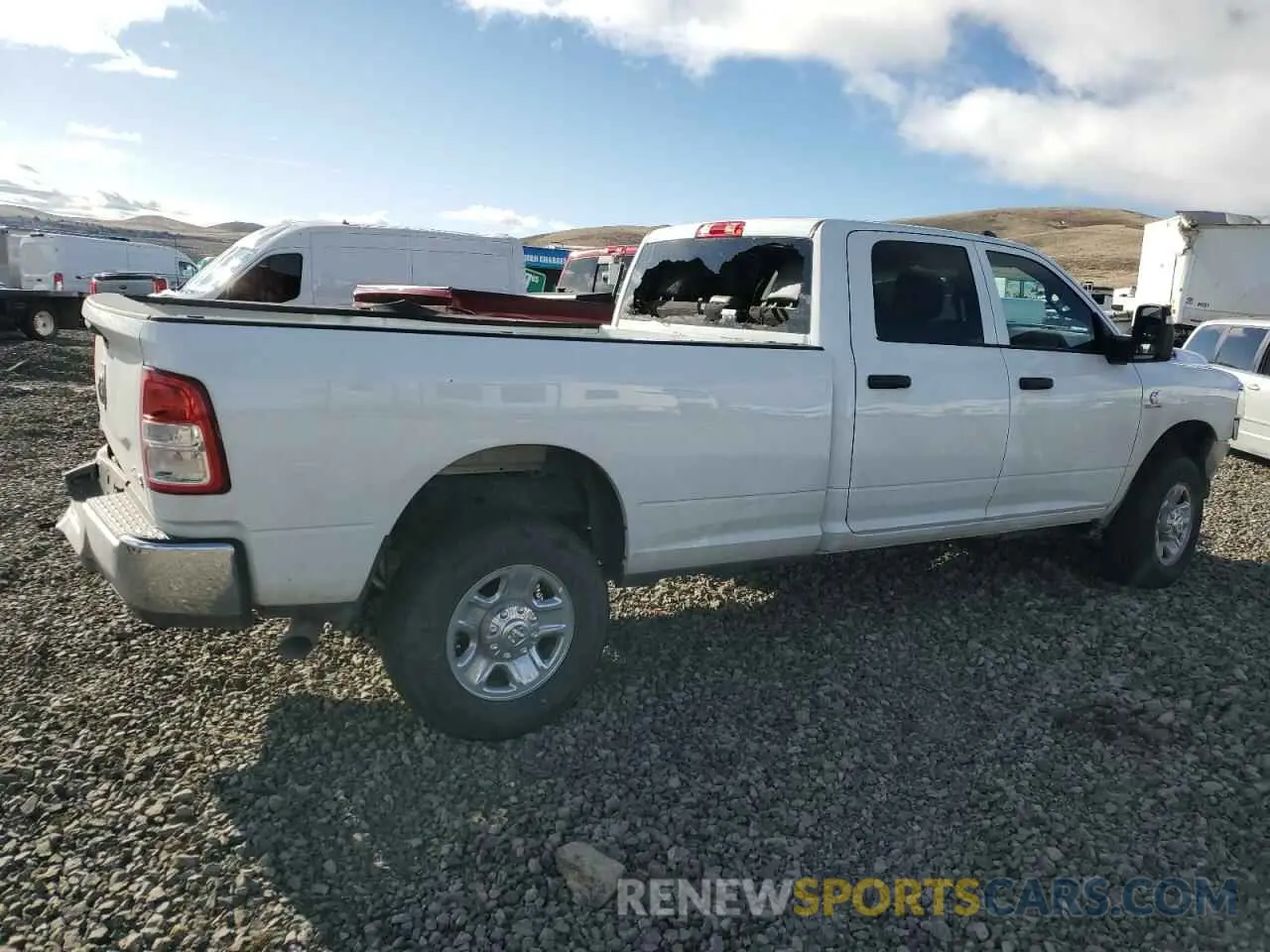 3 Photograph of a damaged car 3C6UR5HL6RG247025 RAM 2500 2024