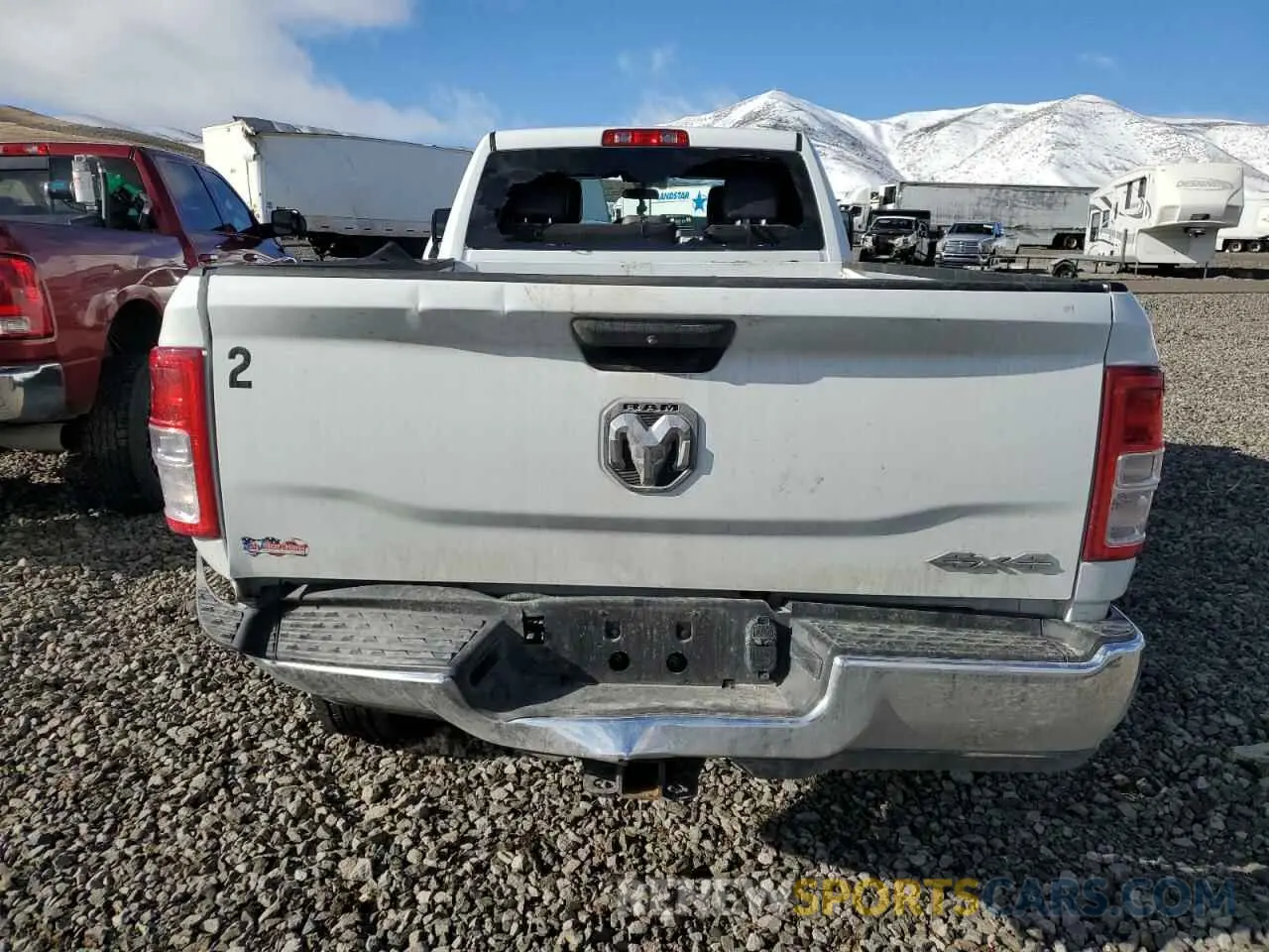 6 Photograph of a damaged car 3C6UR5HL6RG247025 RAM 2500 2024
