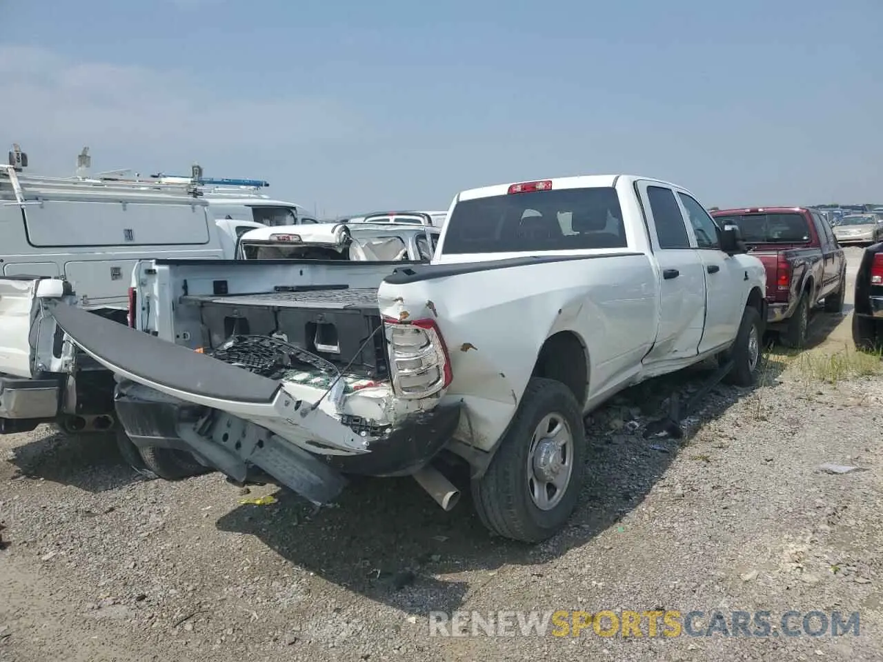 3 Photograph of a damaged car 3C6UR5HL6RG270224 RAM 2500 2024