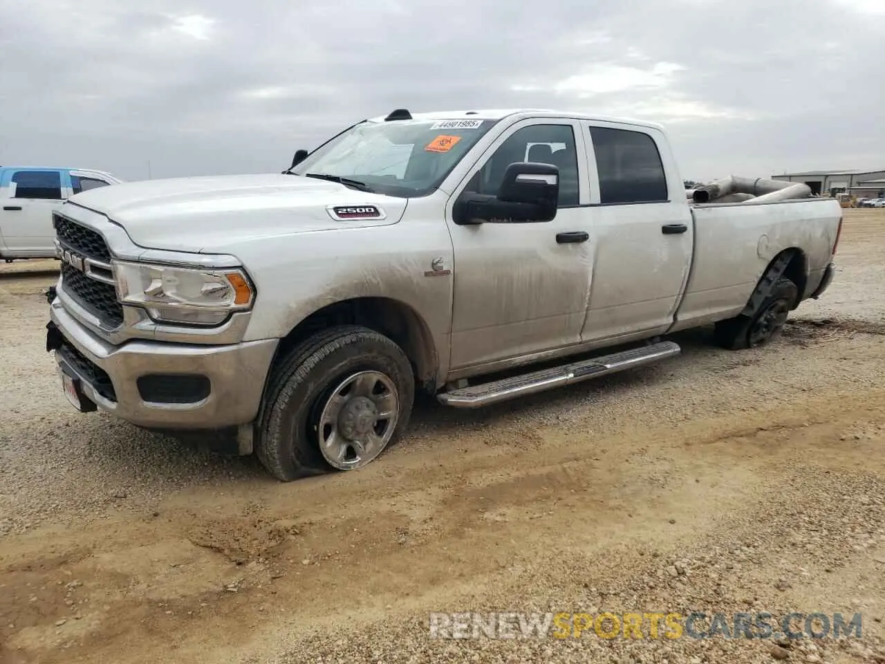 1 Photograph of a damaged car 3C6UR5HL6RG270451 RAM 2500 2024