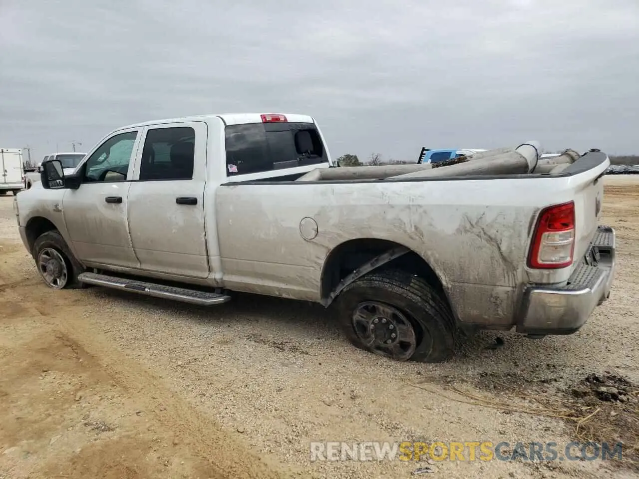 2 Photograph of a damaged car 3C6UR5HL6RG270451 RAM 2500 2024