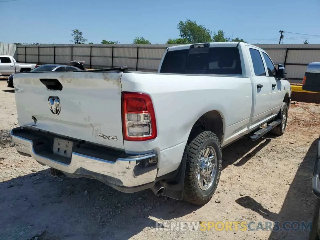3 Photograph of a damaged car 3C6UR5HL9RG141202 RAM 2500 2024